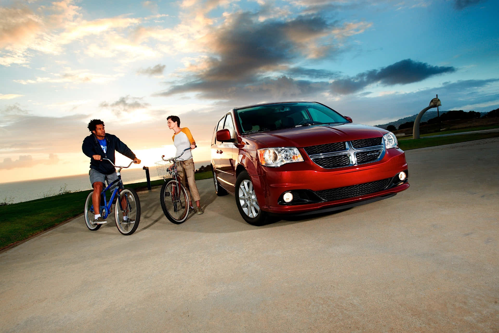 Red Dodge Grand Caravan, bicyclists, sunset, Full HD Desktop Wallpaper