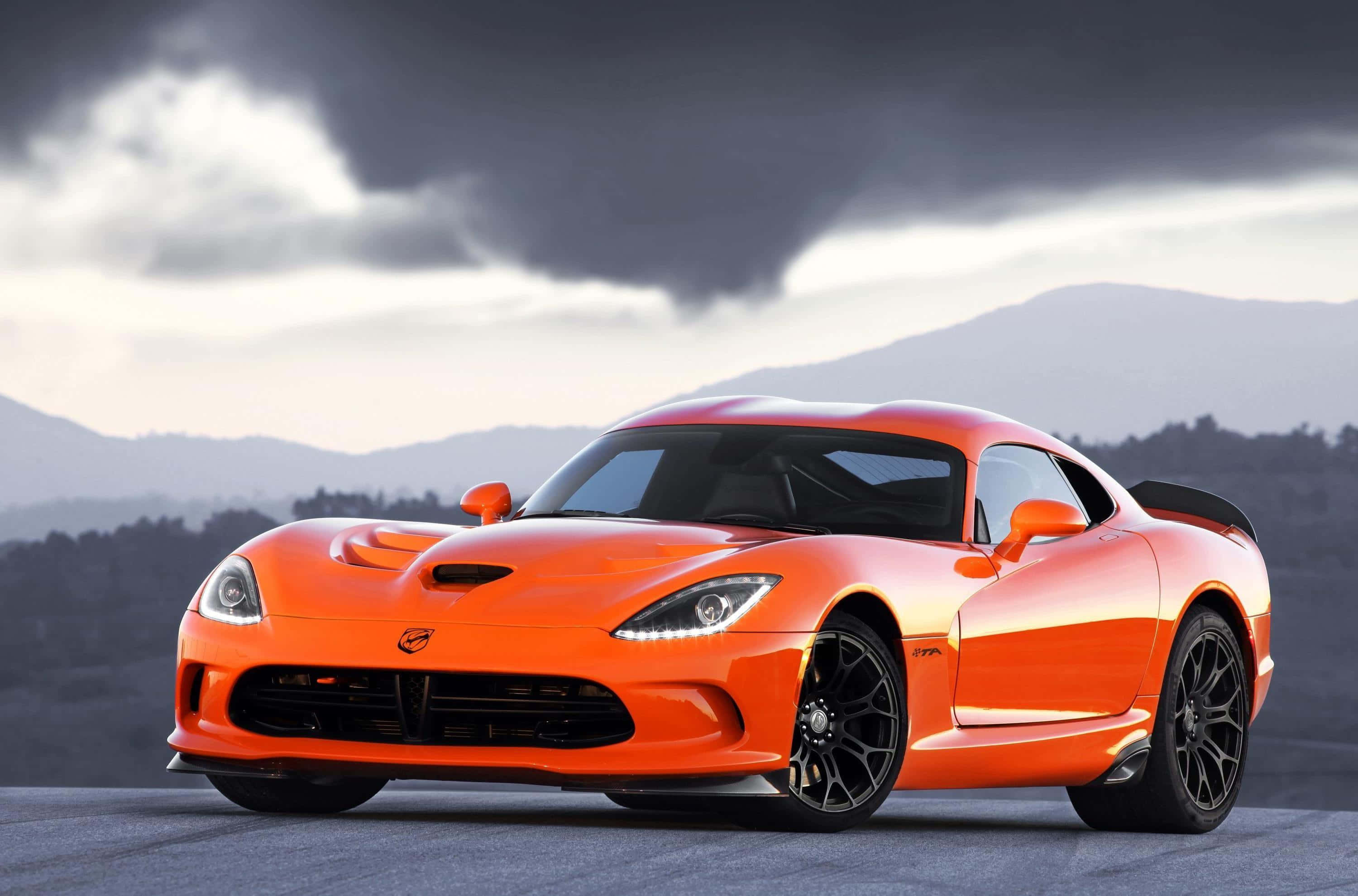 Dodge Viper, vibrant orange, storm clouds, 2K Desktop Wallpaper