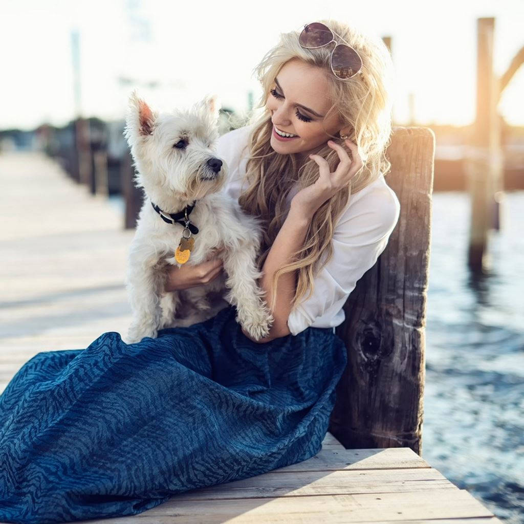 white westie dog, blonde woman, blue skirt, SD Desktop Wallpaper