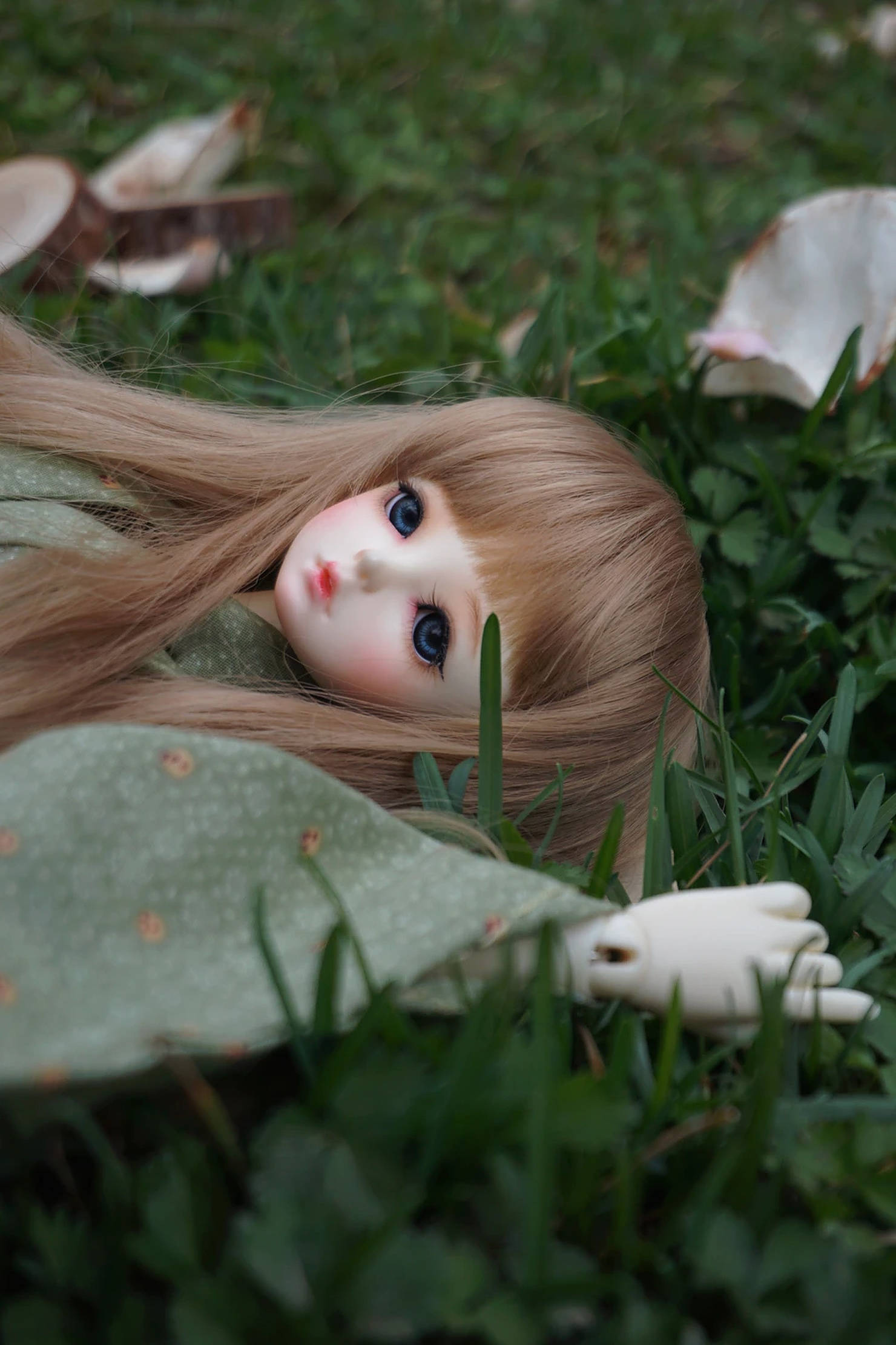 porcelain doll, long blonde hair, lush green grass, Full HD Phone Wallpaper