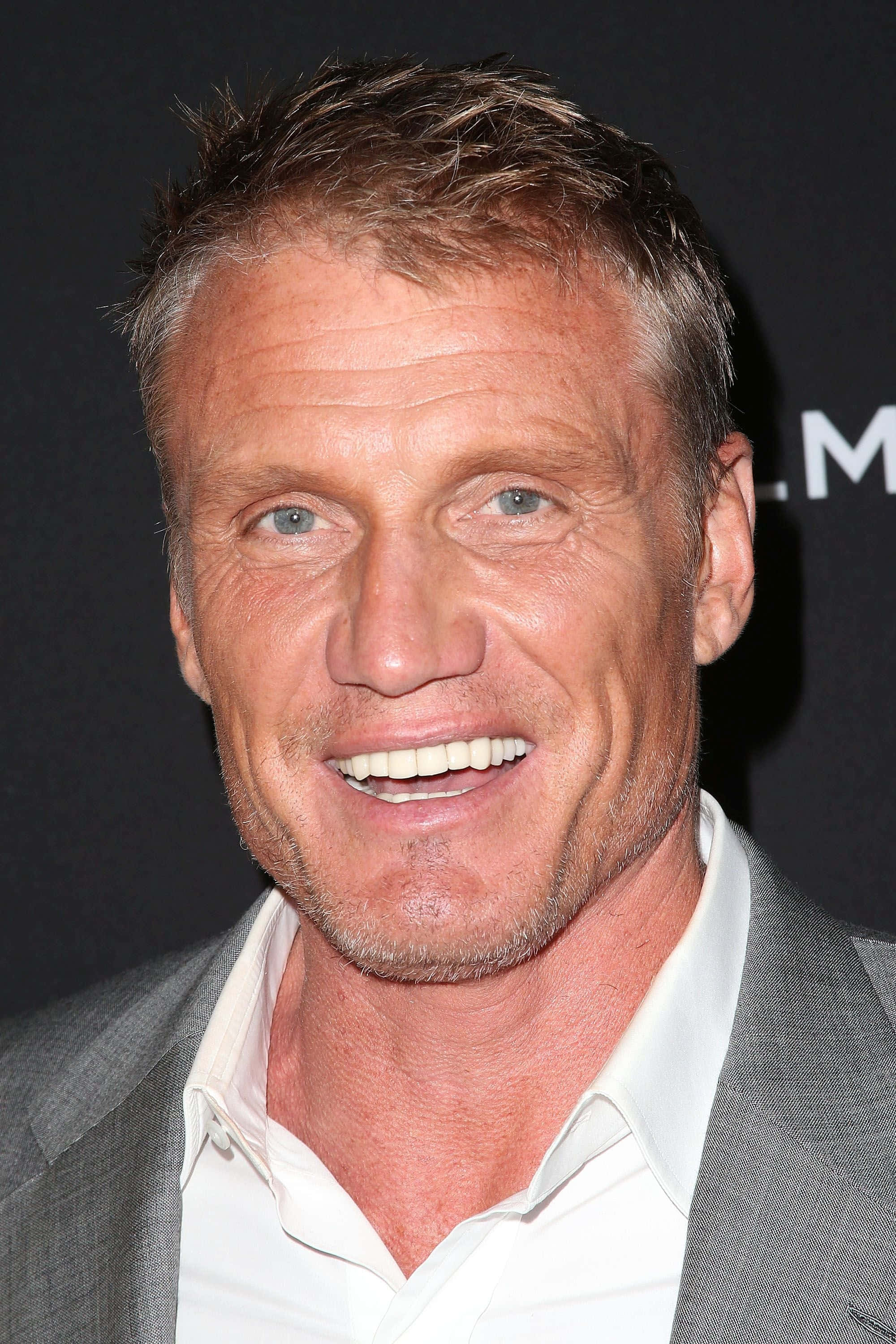 Dolph Lundgren, blue eyes, short graying hair, 2K Phone Wallpaper