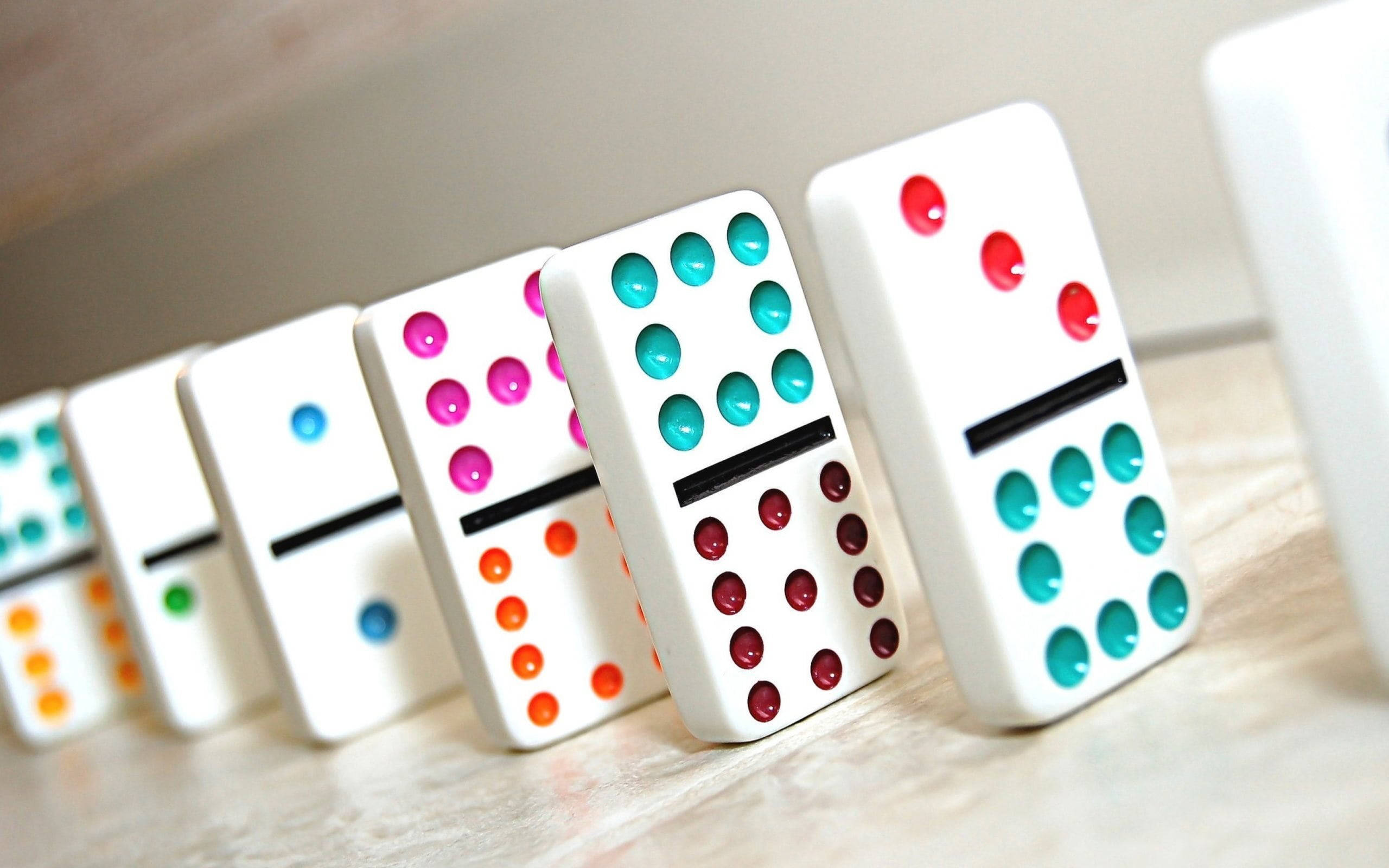 multi colored dominos, glossy dots, light wooden surface, 2K Desktop Wallpaper