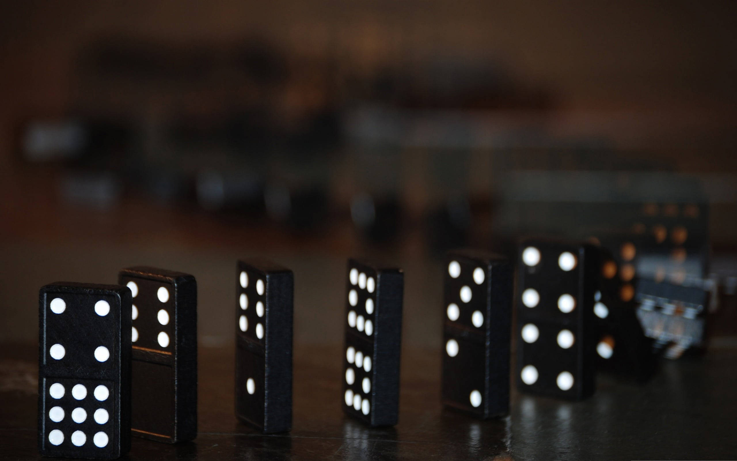 black dominoes, white dots, dark wooden surface, 2K Desktop Wallpaper