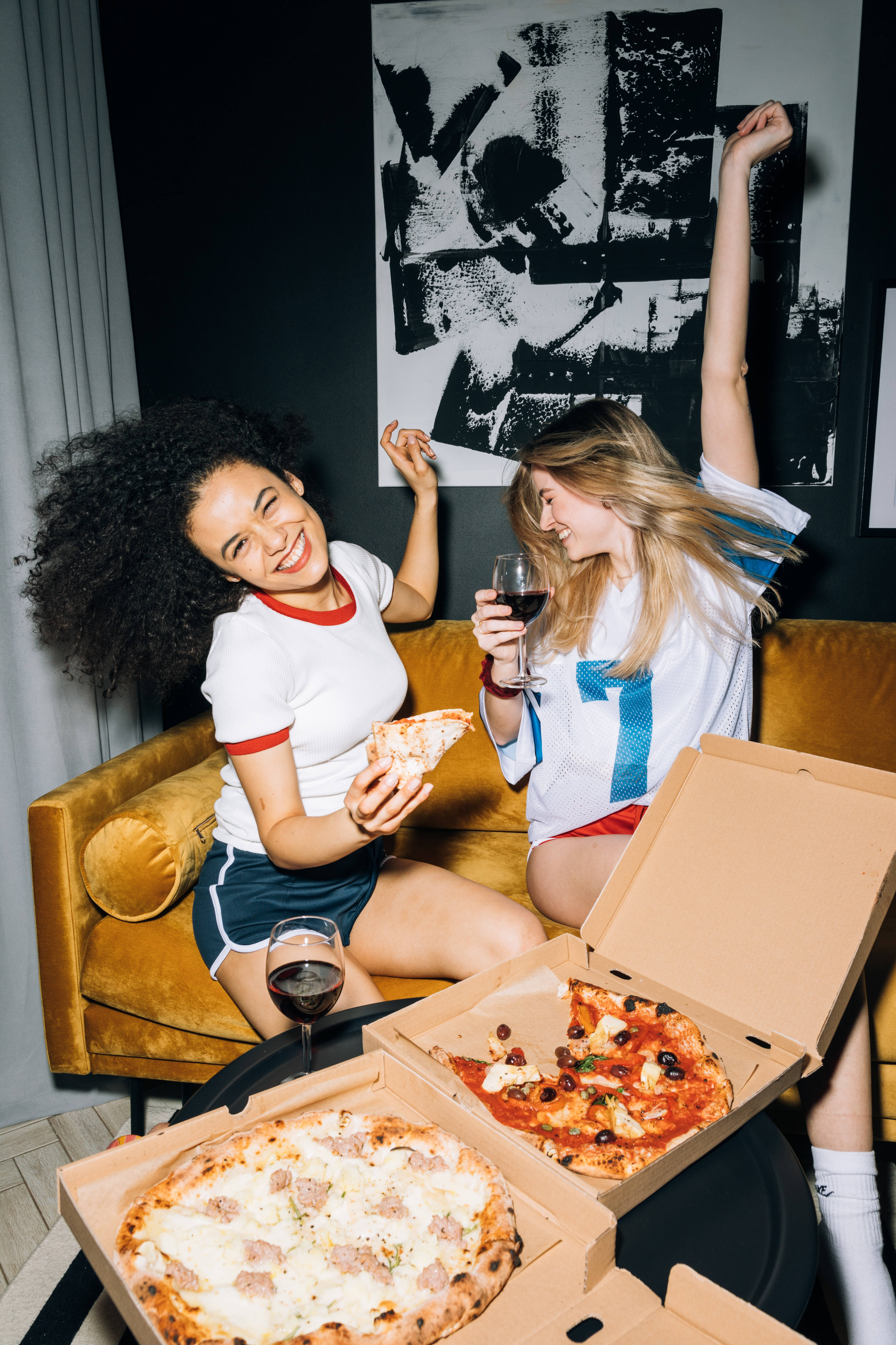 Dominos Pizza, mustard sofa, black and white wall art, 5K Phone Wallpaper