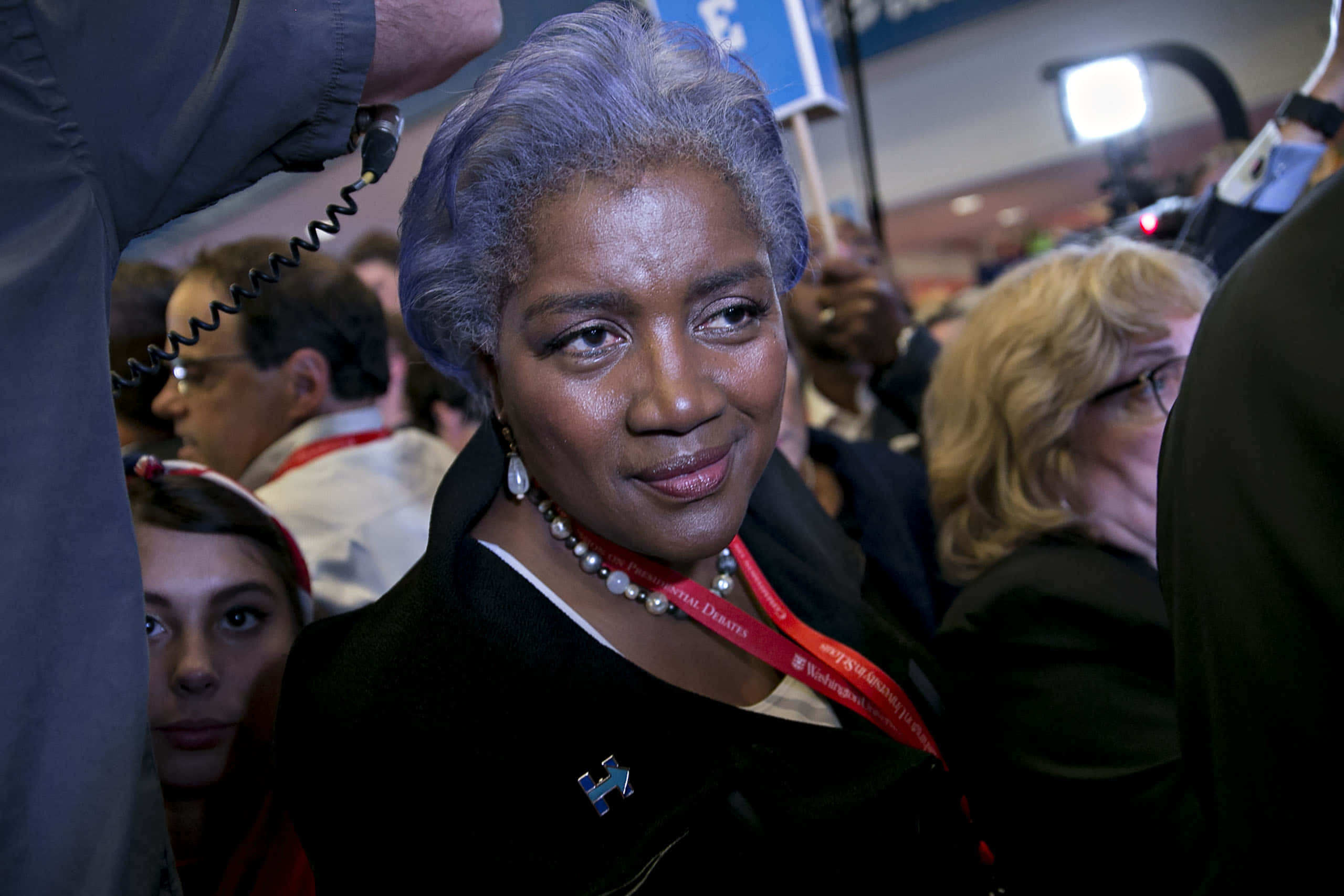 Donna Brazile, silver hair, bustling crowd, 2K Desktop Wallpaper