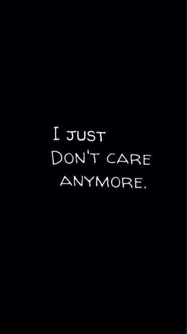 I JUST DON'T CARE ANYMORE, white handwritten text, solid black background, HD Phone Wallpaper