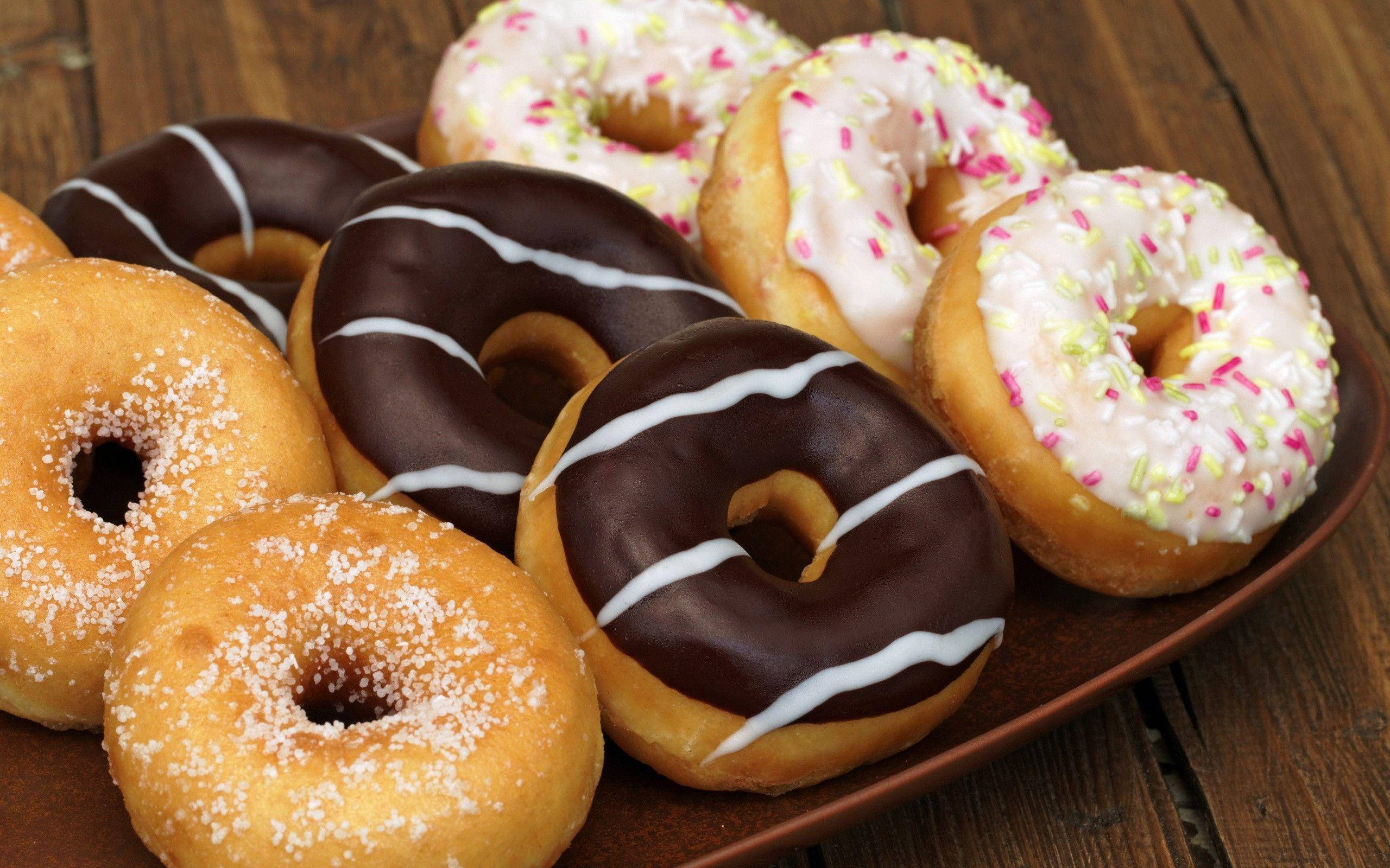 glazed chocolate donut, sprinkled donut, wooden plate, 2K Desktop Wallpaper