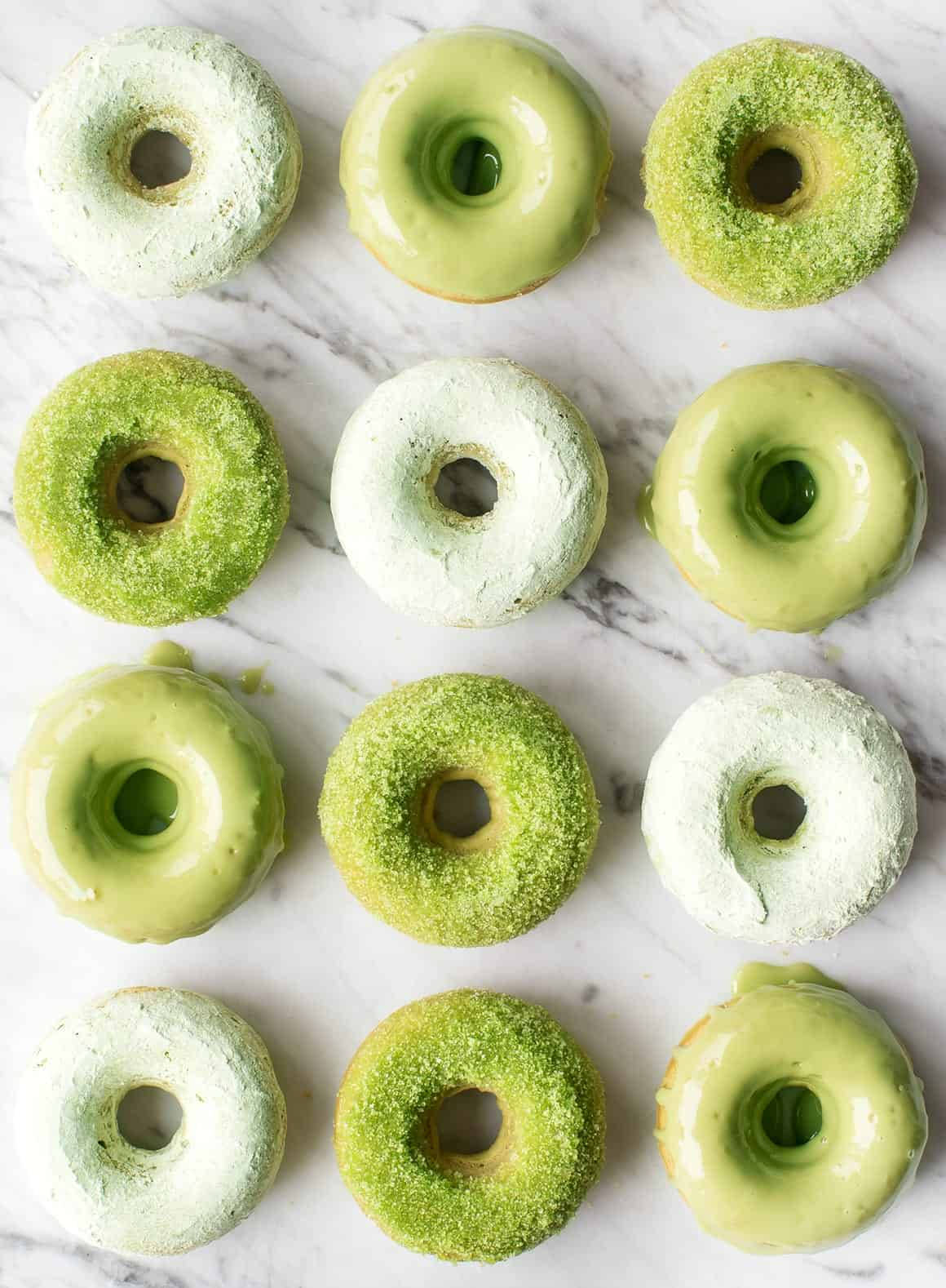 matcha-glazed donuts, sugar dusting, white marble surface, HD Phone Wallpaper