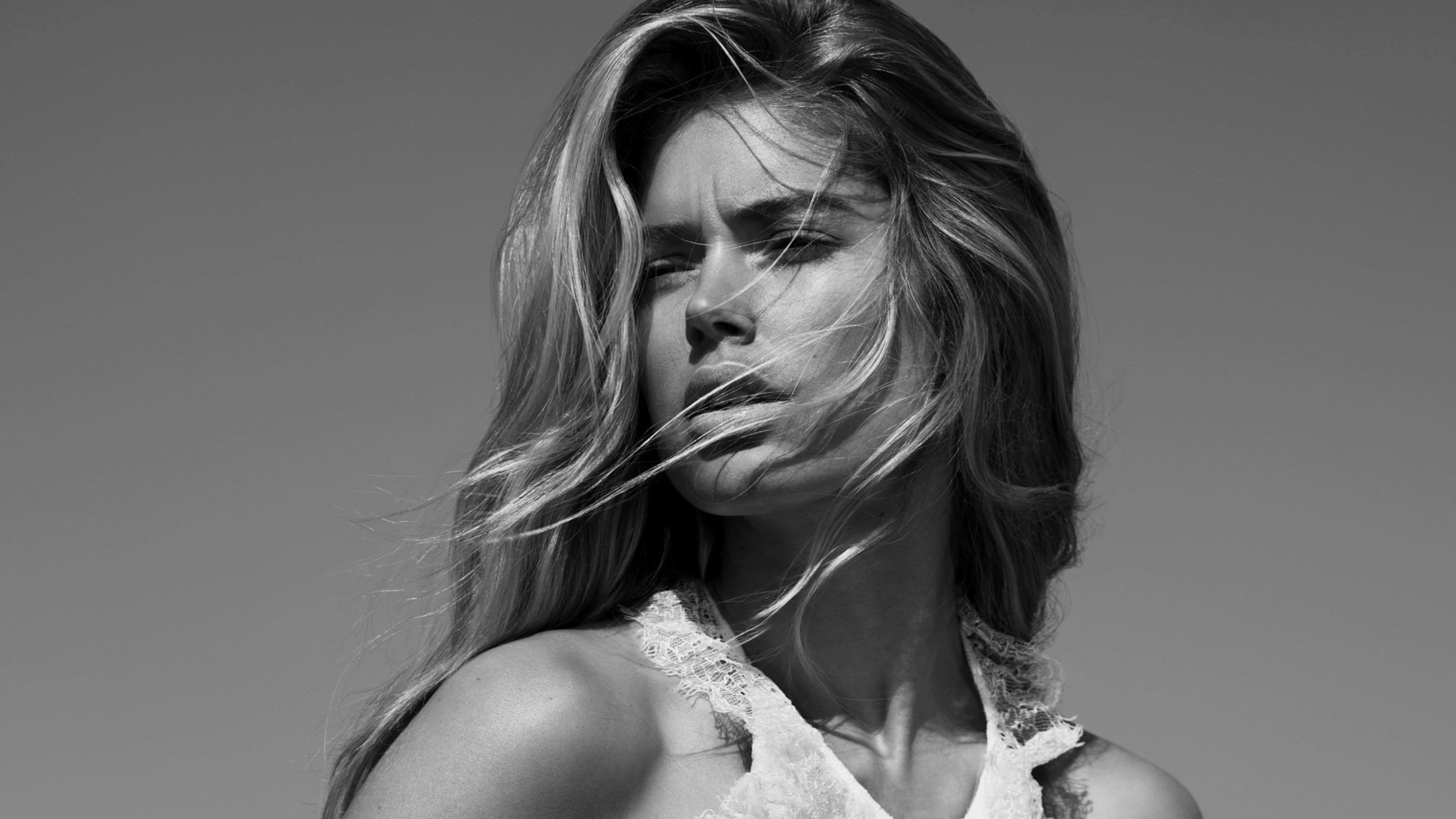 Doutzen Kroes, black and white portrait, wind-swept hair, 8K Desktop Wallpaper