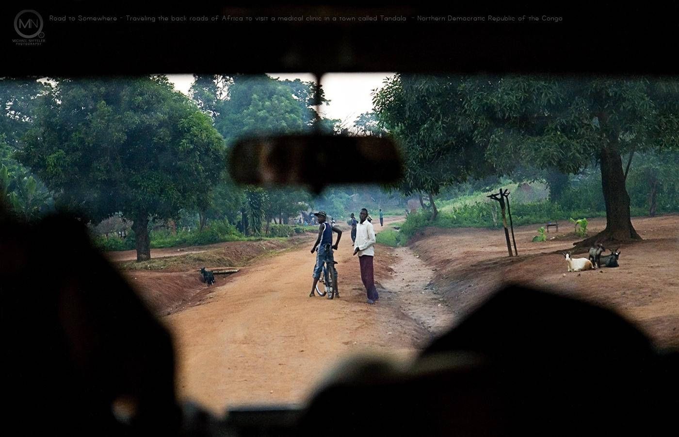 dirt road, lush green trees, rural African setting, HD Desktop Wallpaper