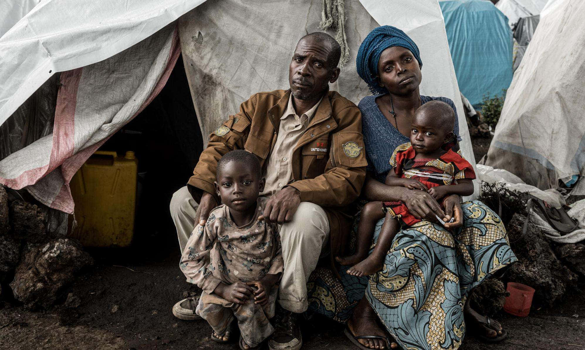 D R Congo, family of four, tattered white tent, Full HD Desktop Wallpaper