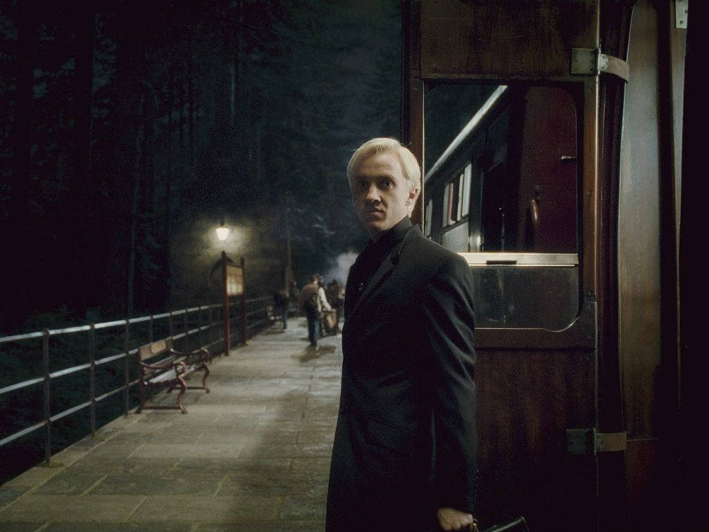 Draco Malfoy, black coat, dimly lit train station platform, SD Desktop Wallpaper
