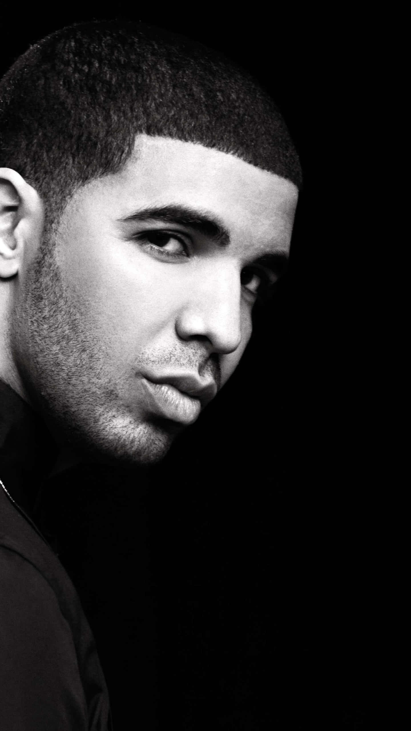 Drake, black and white portrait, shaved head, 2K Phone Wallpaper