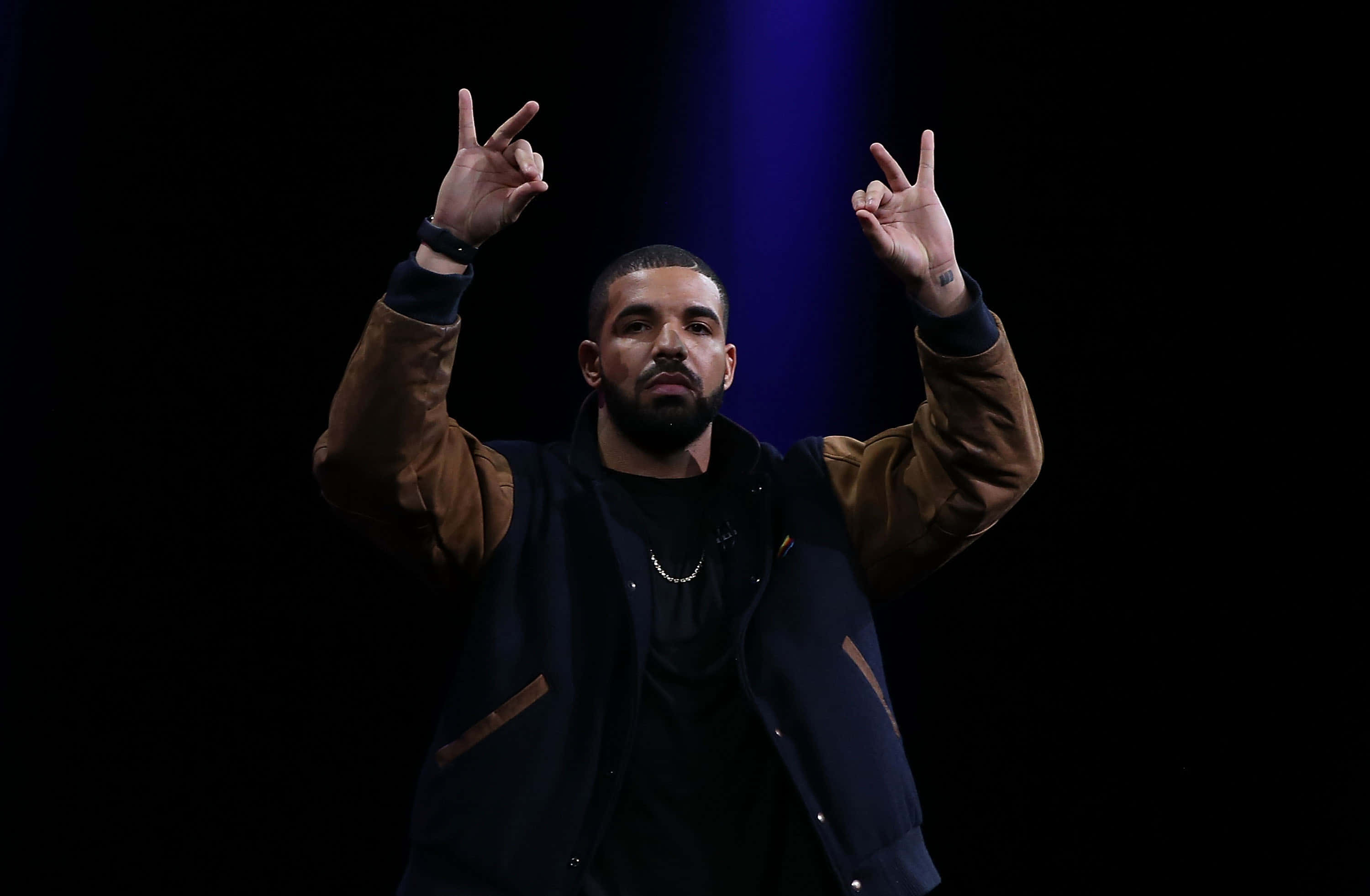Drake Computer, blue spotlight, black background, 2K Desktop Wallpaper