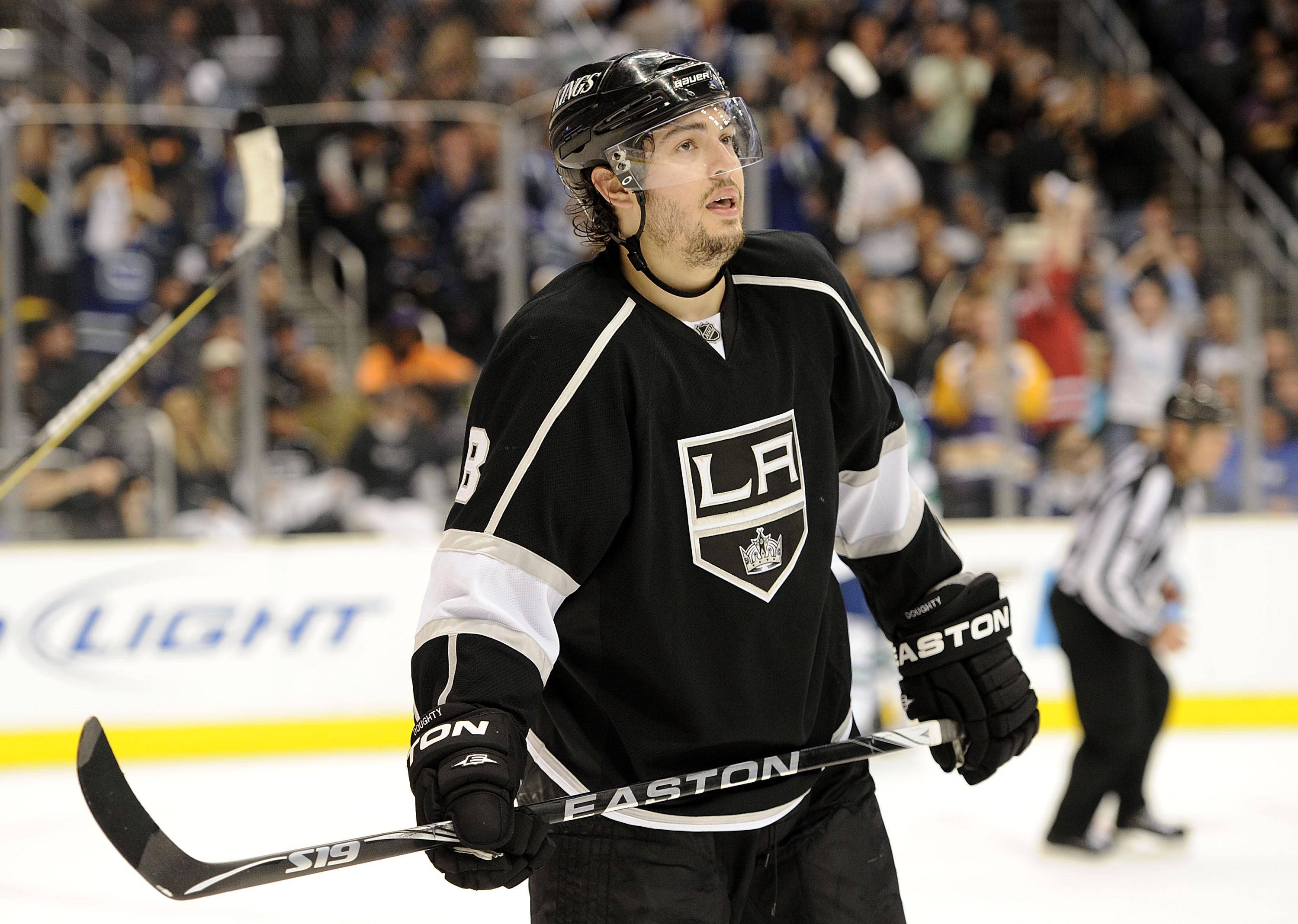 Drew Doughty, black LA Kings jersey, hockey stick, 2K Desktop Wallpaper