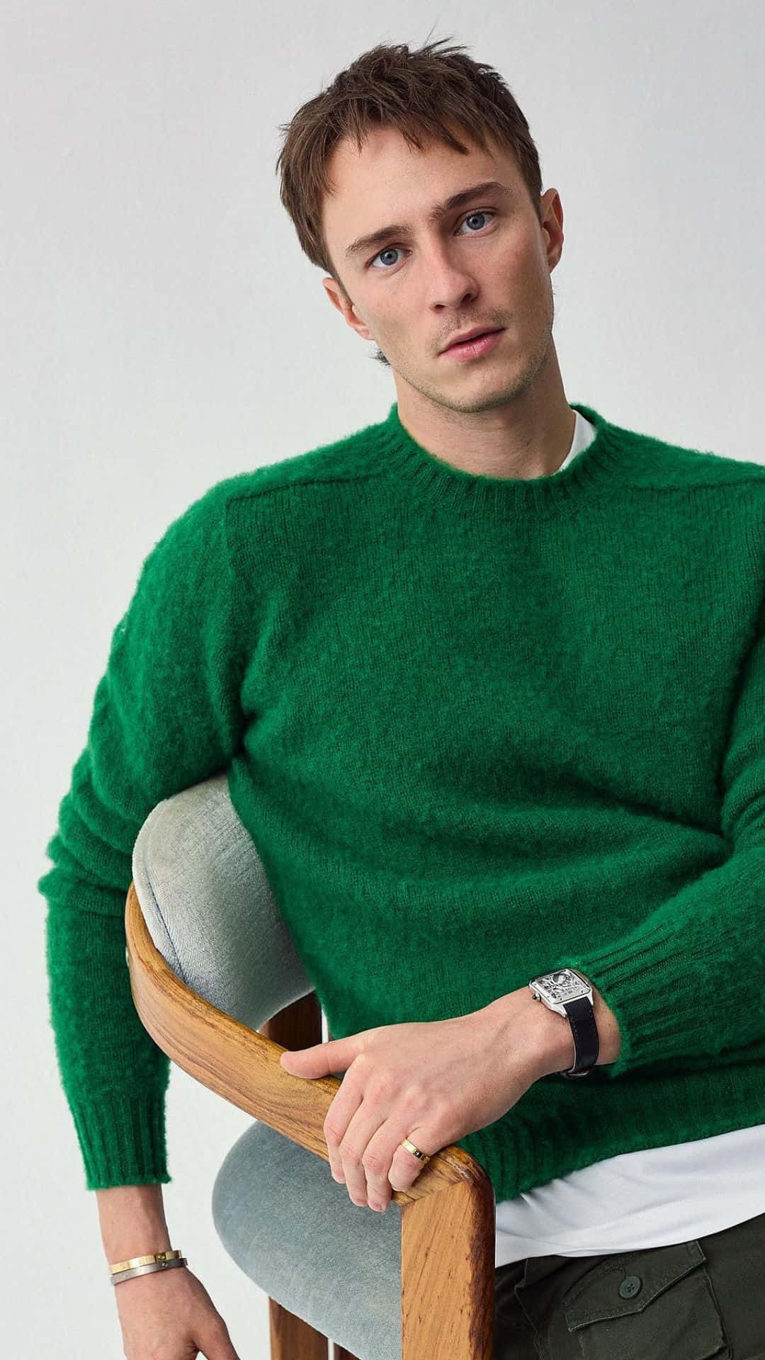 Drew Starkey, casual green sweater, wooden chair, Full HD Phone Wallpaper