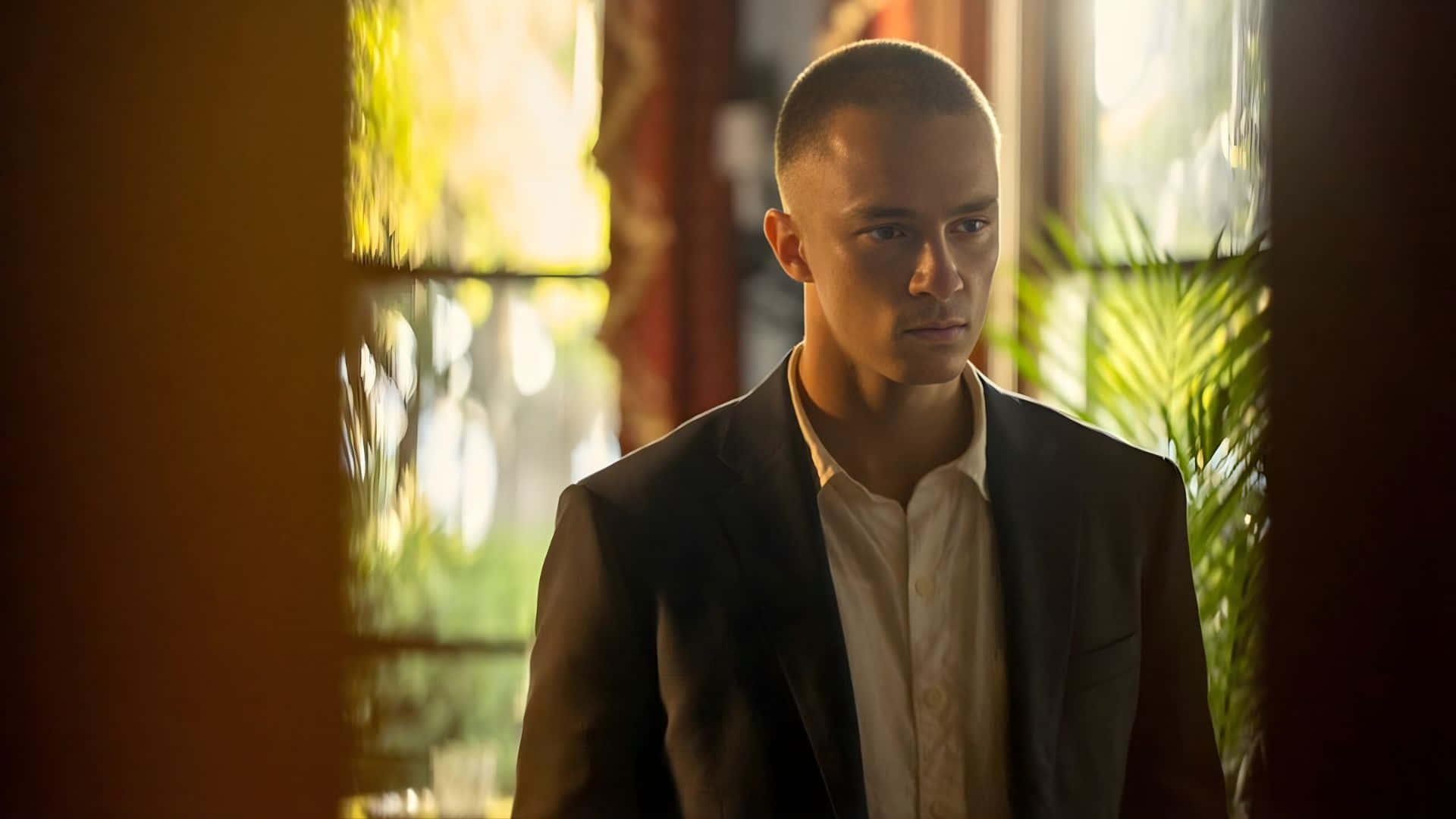 Drew Starkey, dark suit, warm golden light, Full HD Desktop Wallpaper