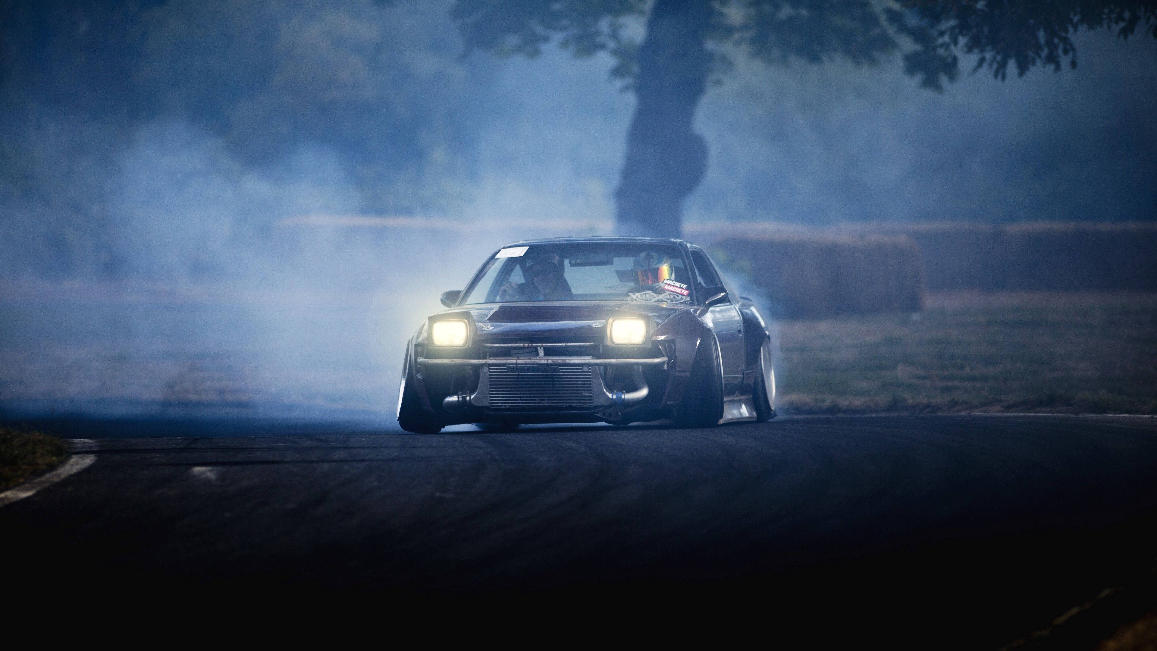 drift car, glowing headlights, misty forest track, 4K Desktop Wallpaper