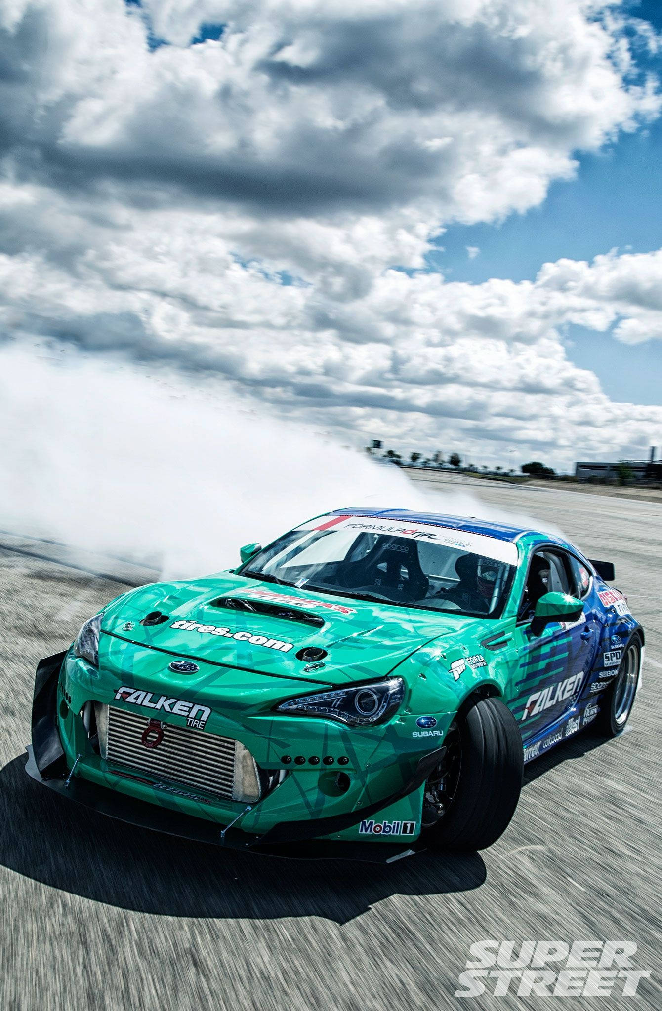 drifting, green car, sunlit racetrack, Full HD Phone Wallpaper
