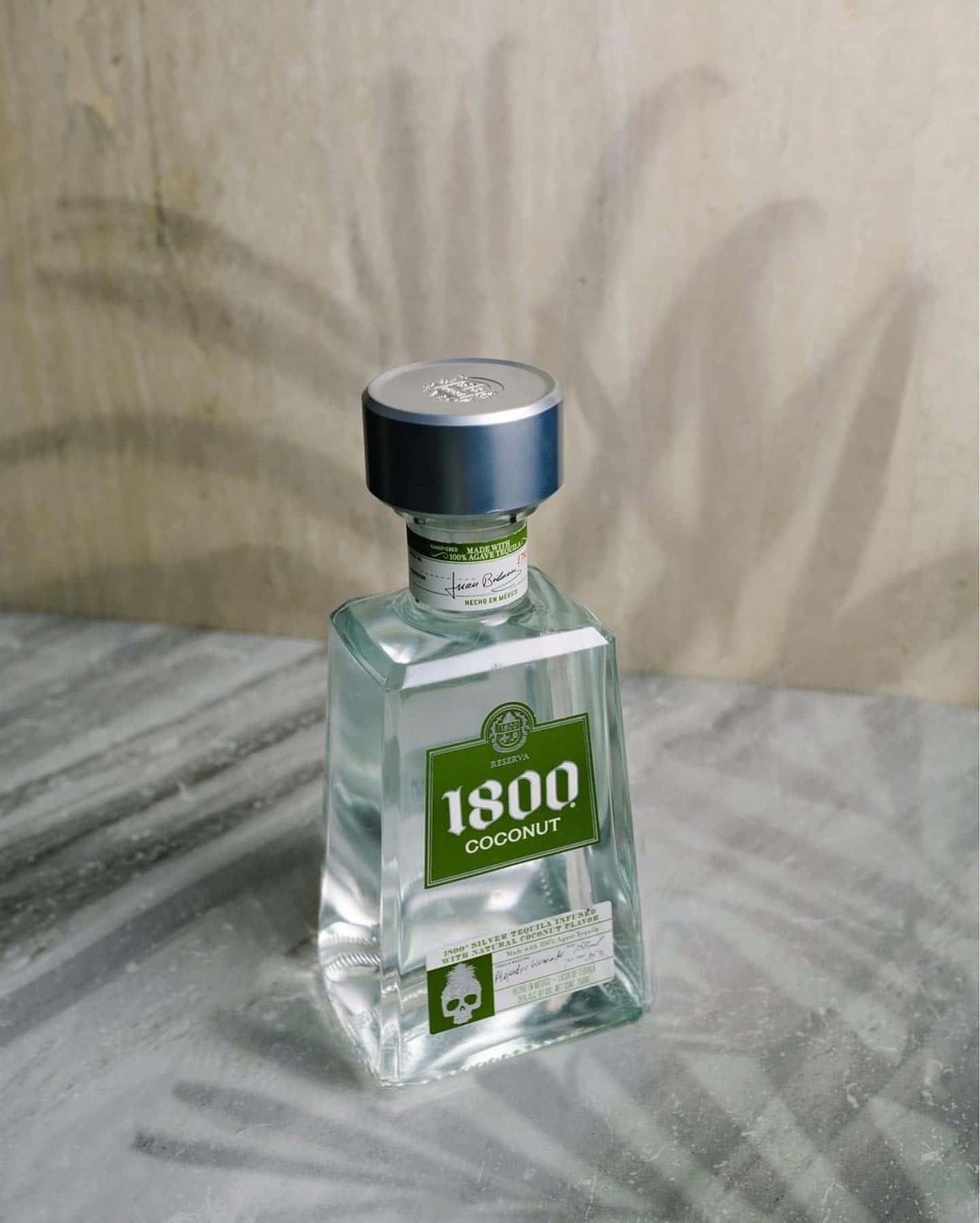 1800 Tequila Reserva Coconut, green label, marble surface, HD Phone Wallpaper