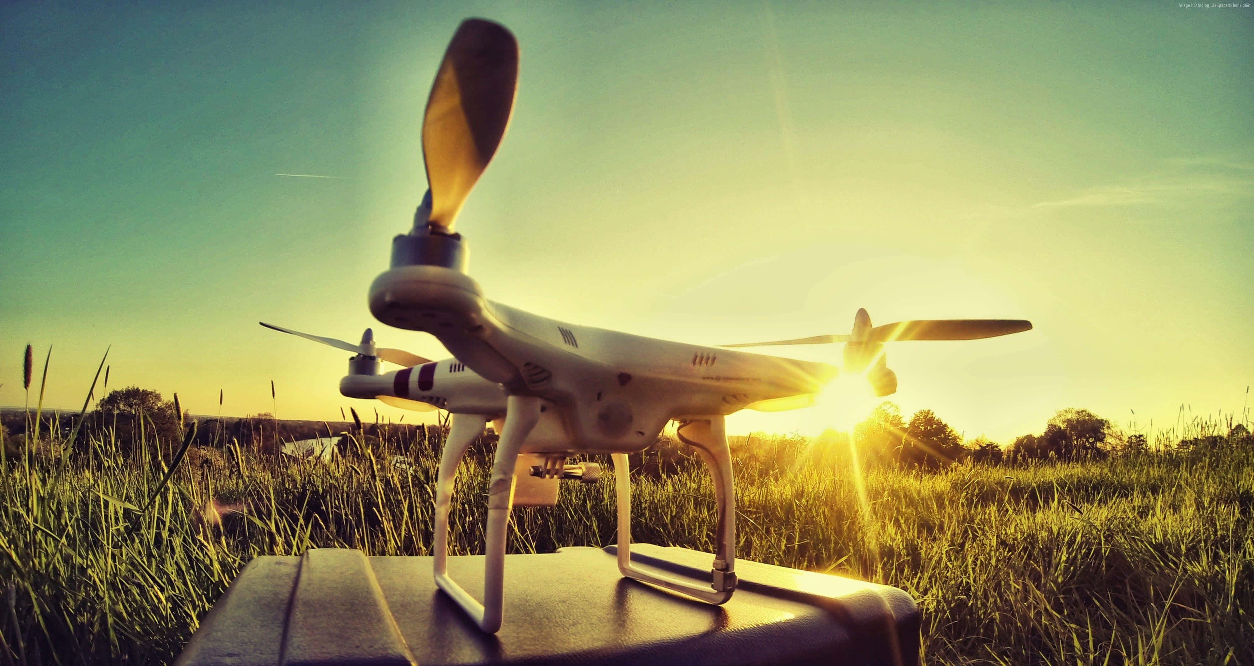 sunset, white drone, grassy field, 4K Desktop Wallpaper