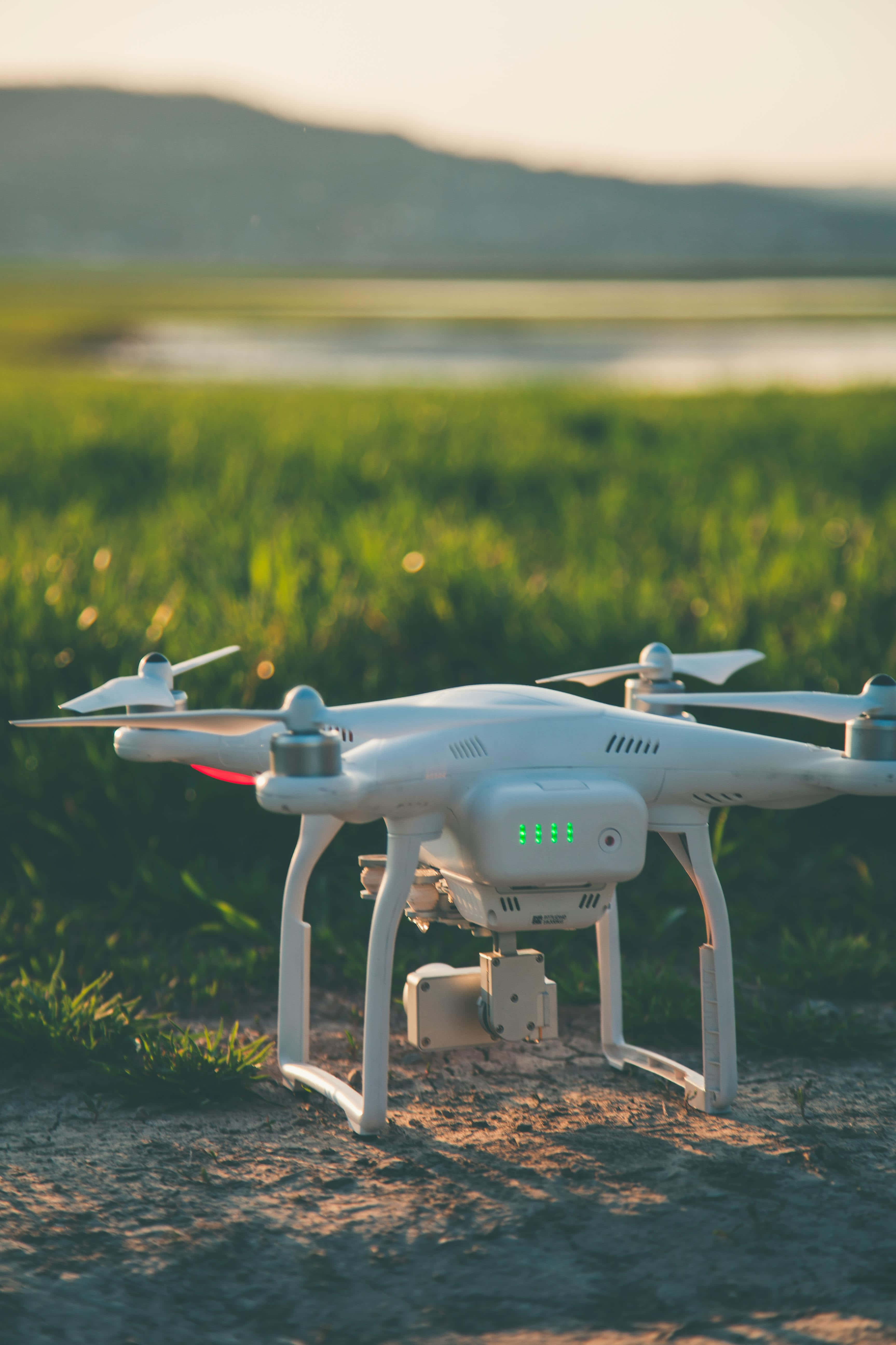 drone, white drone, glowing green lights, 5K Phone Wallpaper