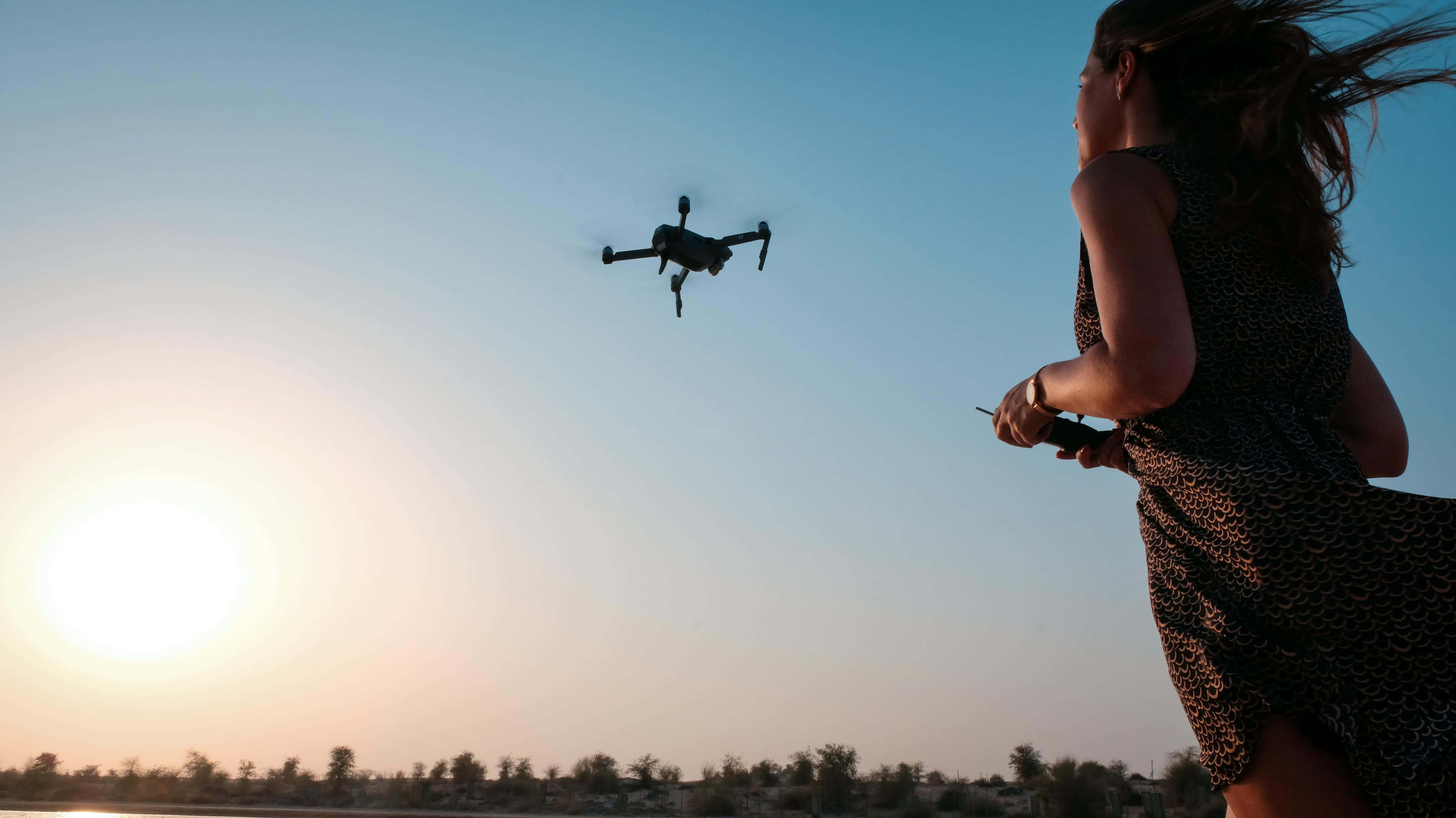woman, drone, sunset, 4K Desktop Wallpaper