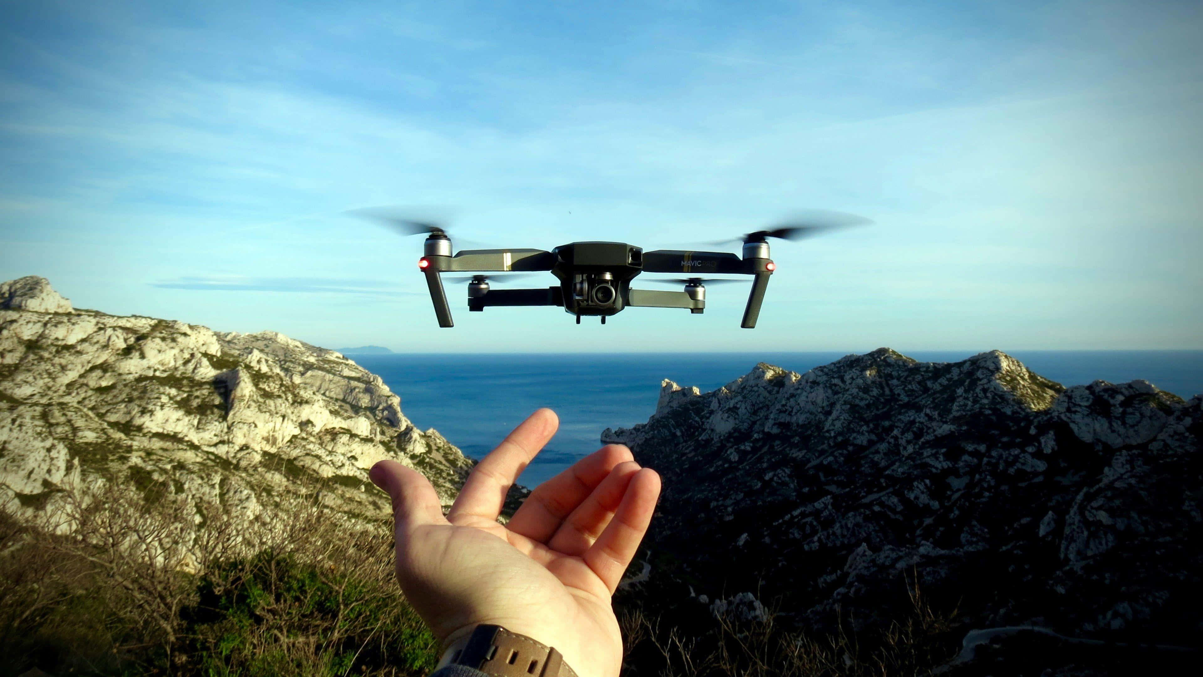 drone, mountainous terrain, rugged cliffs, 4K Desktop Wallpaper