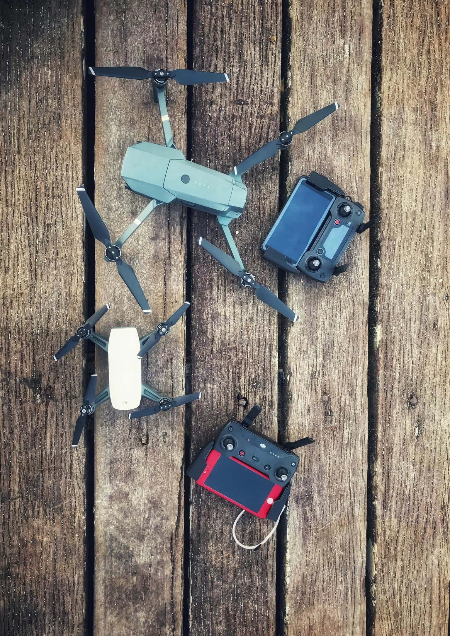 compact drone, controller, wooden planks, Full HD Phone Wallpaper