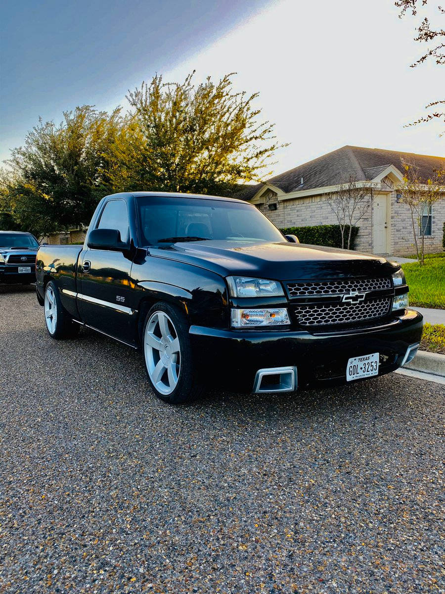 Chevrolet pickup truck, glossy black, gravel driveway, SD Phone Wallpaper