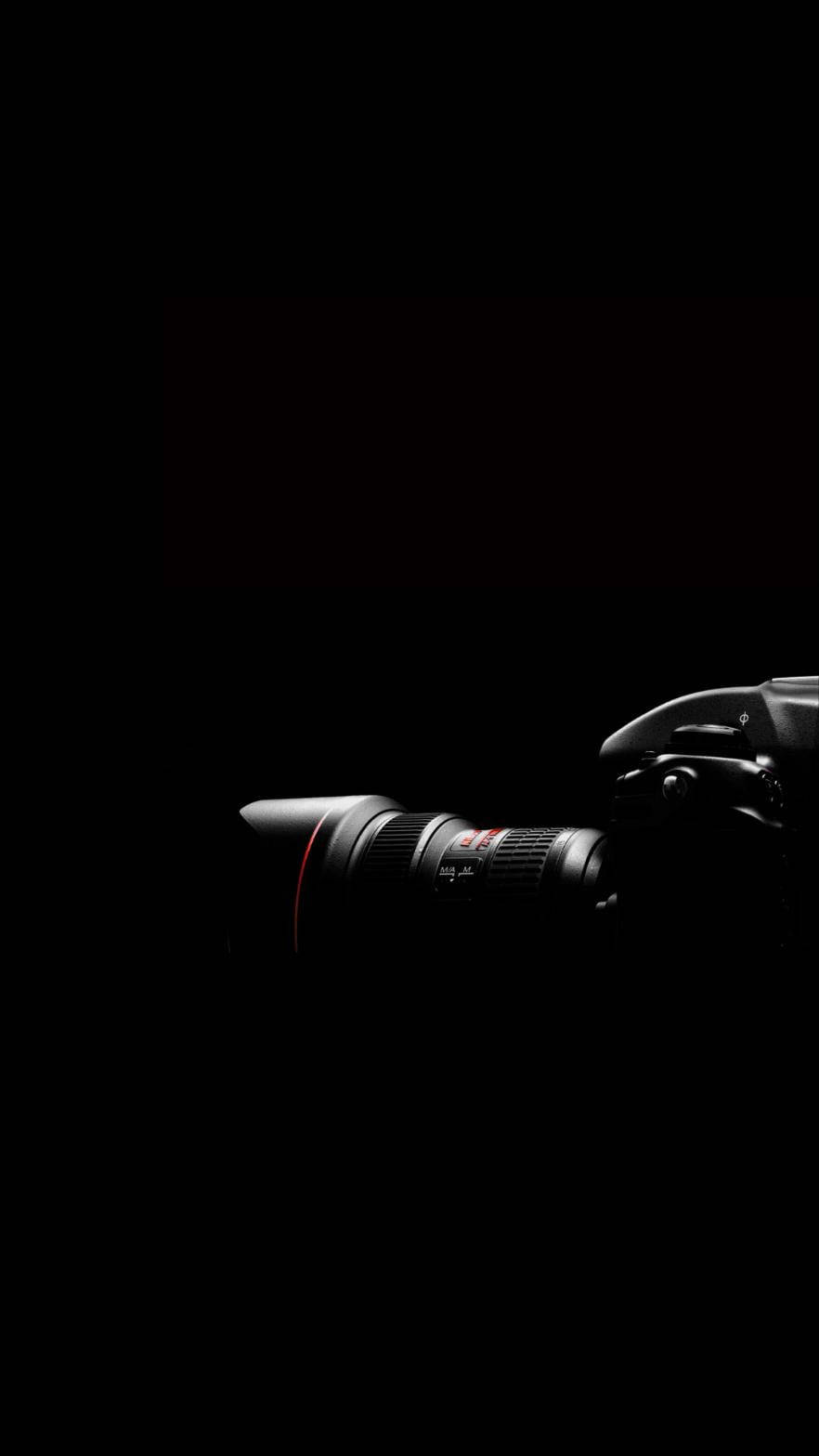 shiny black dslr camera, telephoto lens, pitch-black background, HD Phone Wallpaper