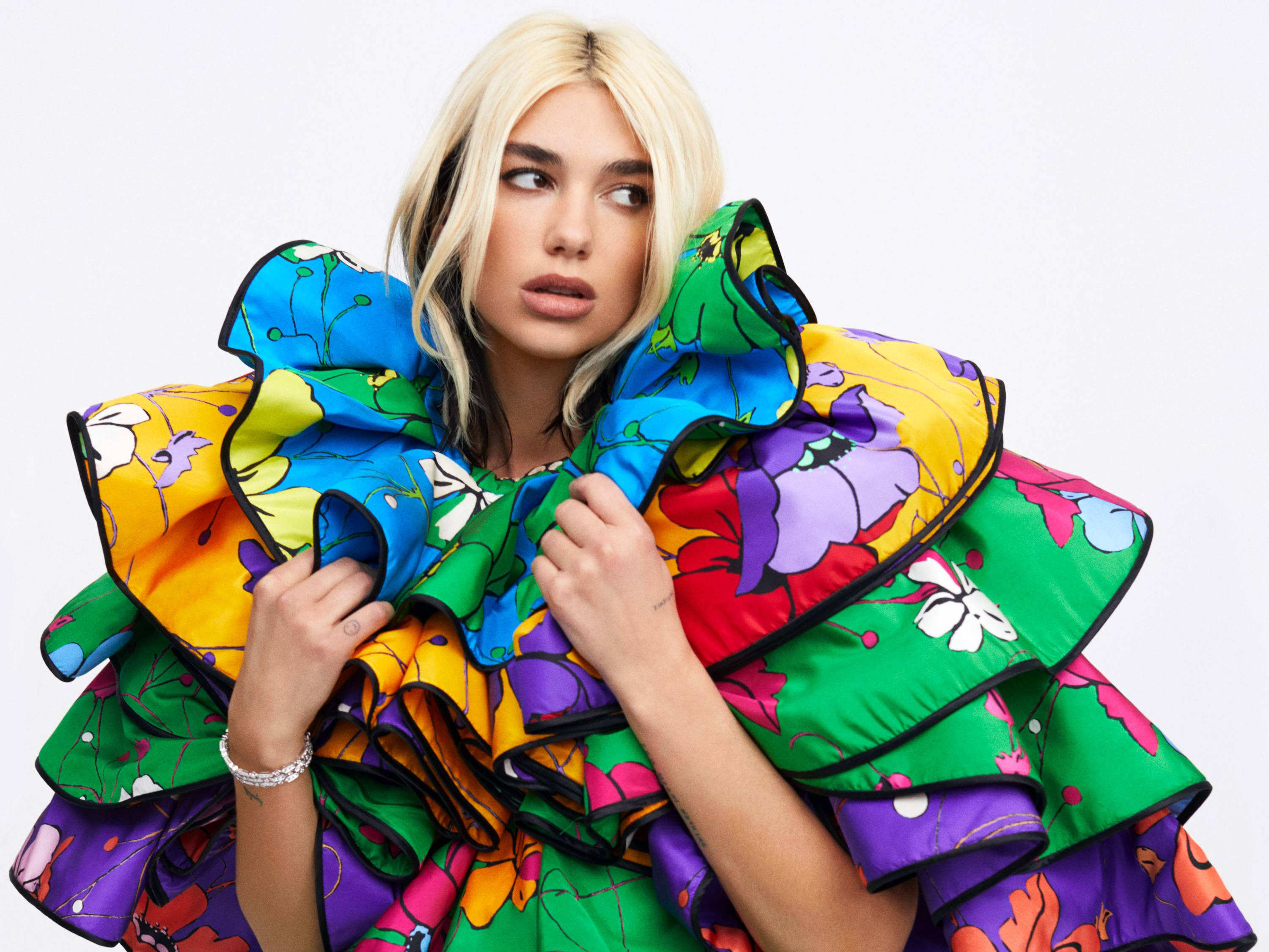 Dua Lipa, vibrant multicolored floral ruffled garment, blonde woman, 2K Desktop Wallpaper
