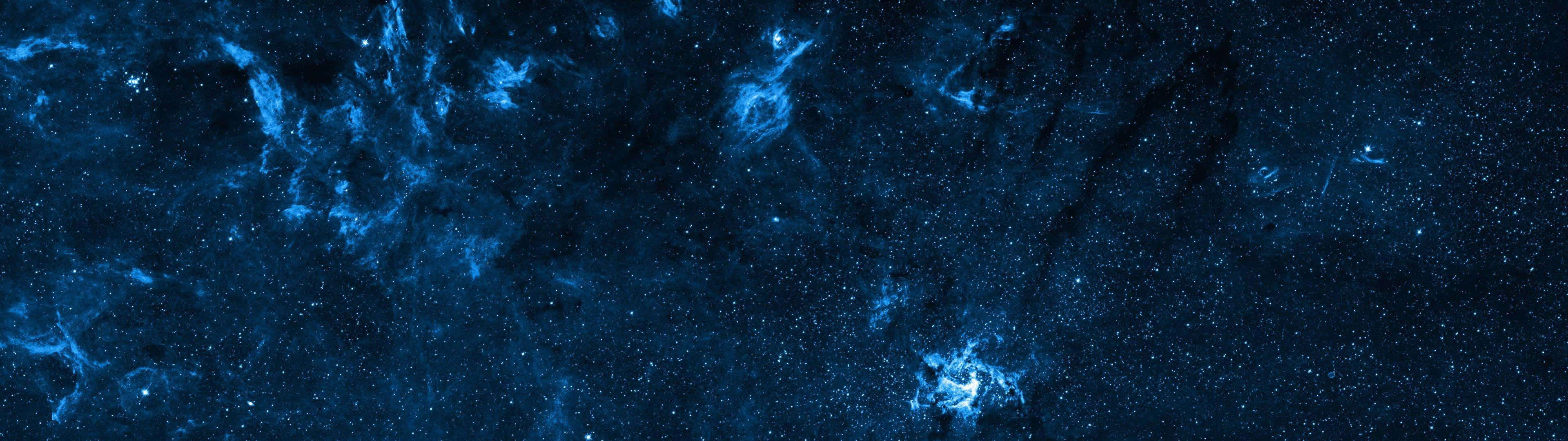 dual screen space, deep blue nebulae, glowing star clusters, 4K Desktop Wallpaper