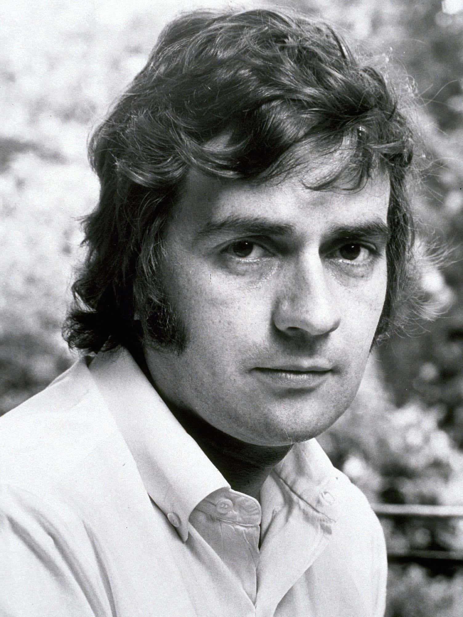 Dudley Moore, black and white portrait, wavy hair, Full HD Phone Wallpaper