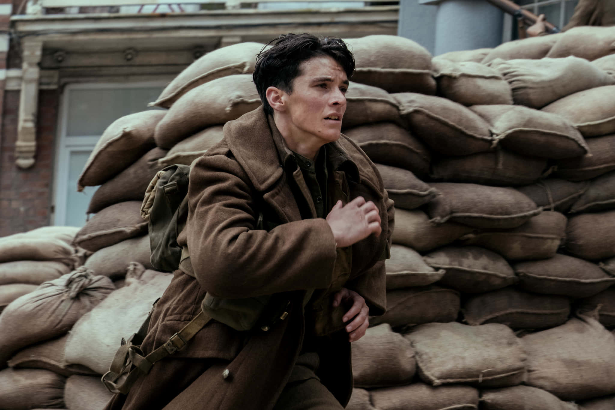 Dunkirk, brown coat, sandbag barricades, Full HD Desktop Wallpaper