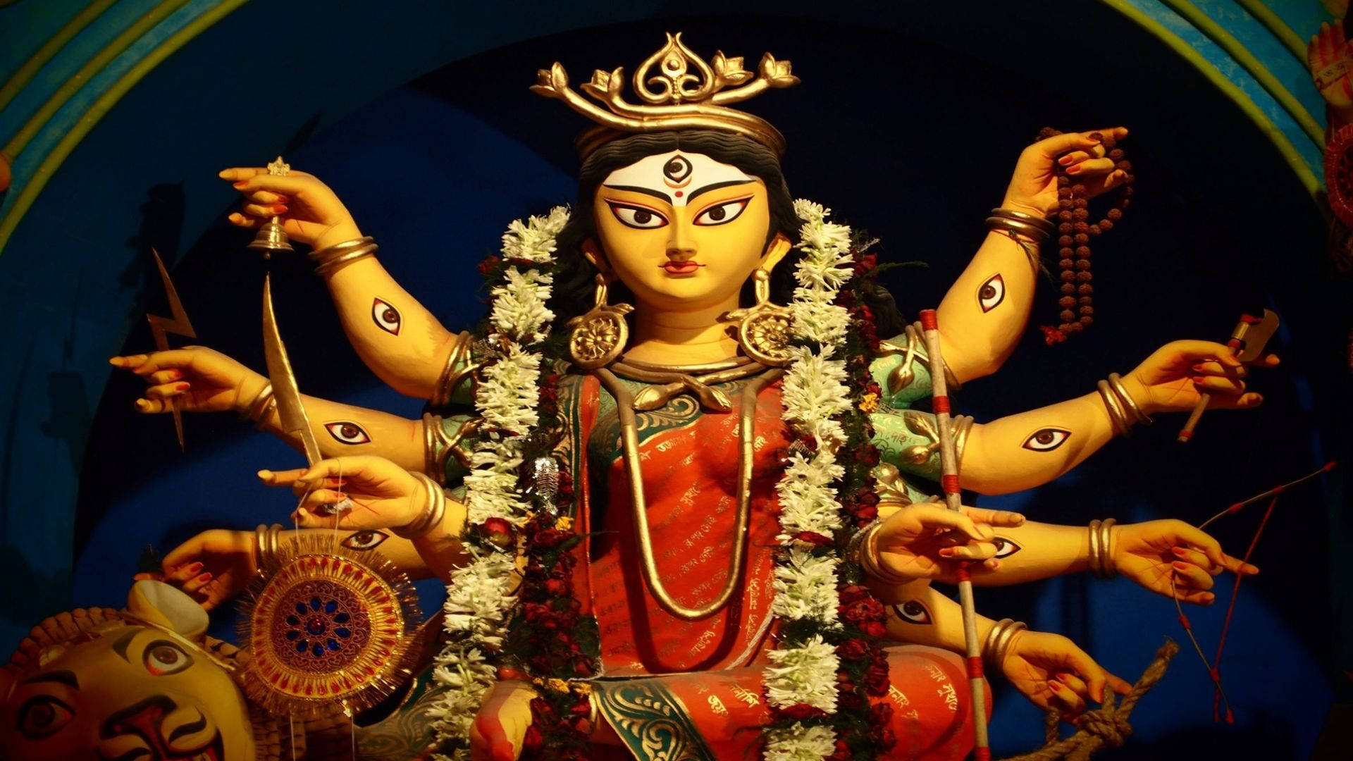 Durga Mata, multi-armed Hindu goddess statue, white flowers, Full HD Desktop Wallpaper