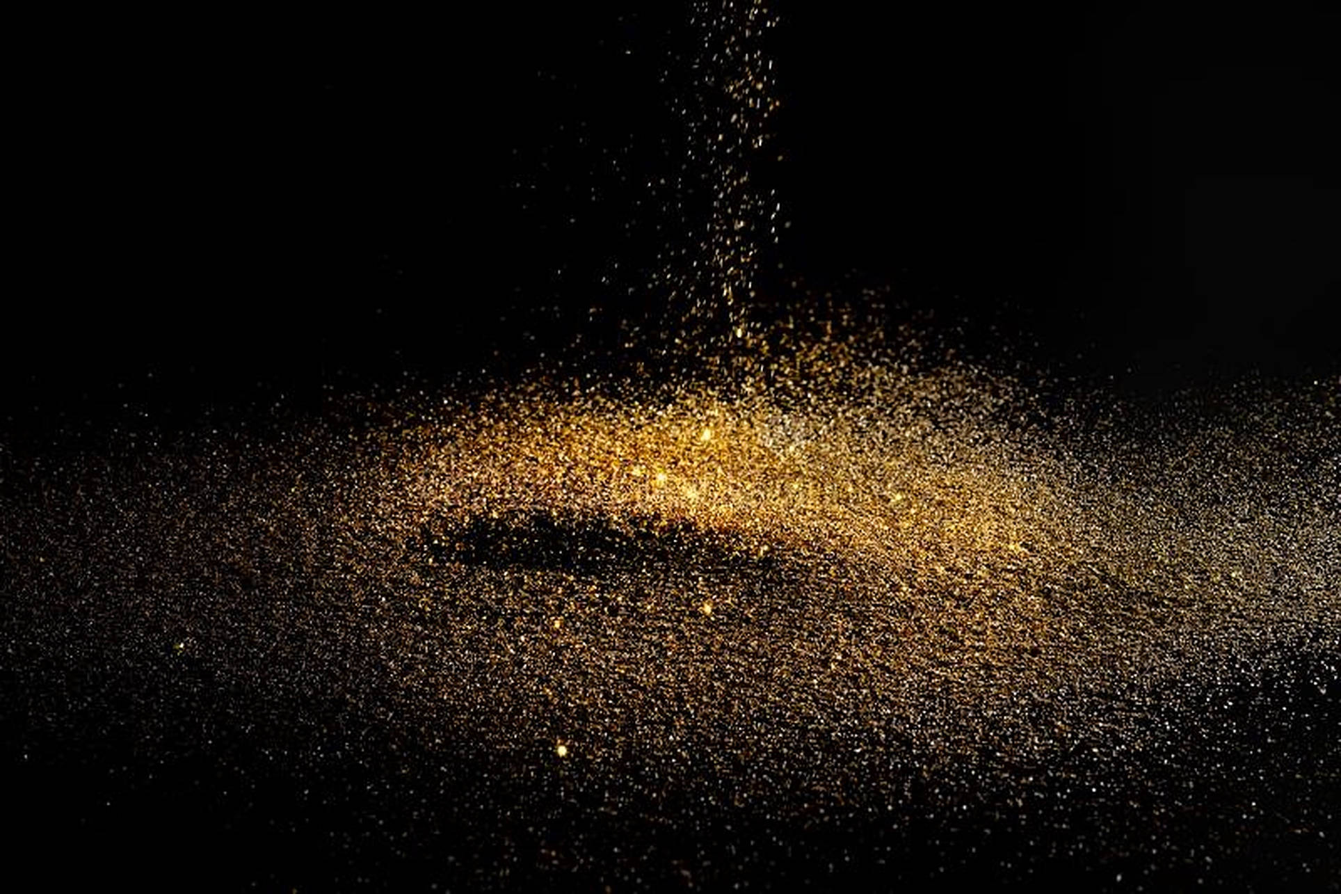 Trickling Gold Dust, golden glitter particles, stark black background, Full HD Desktop Wallpaper