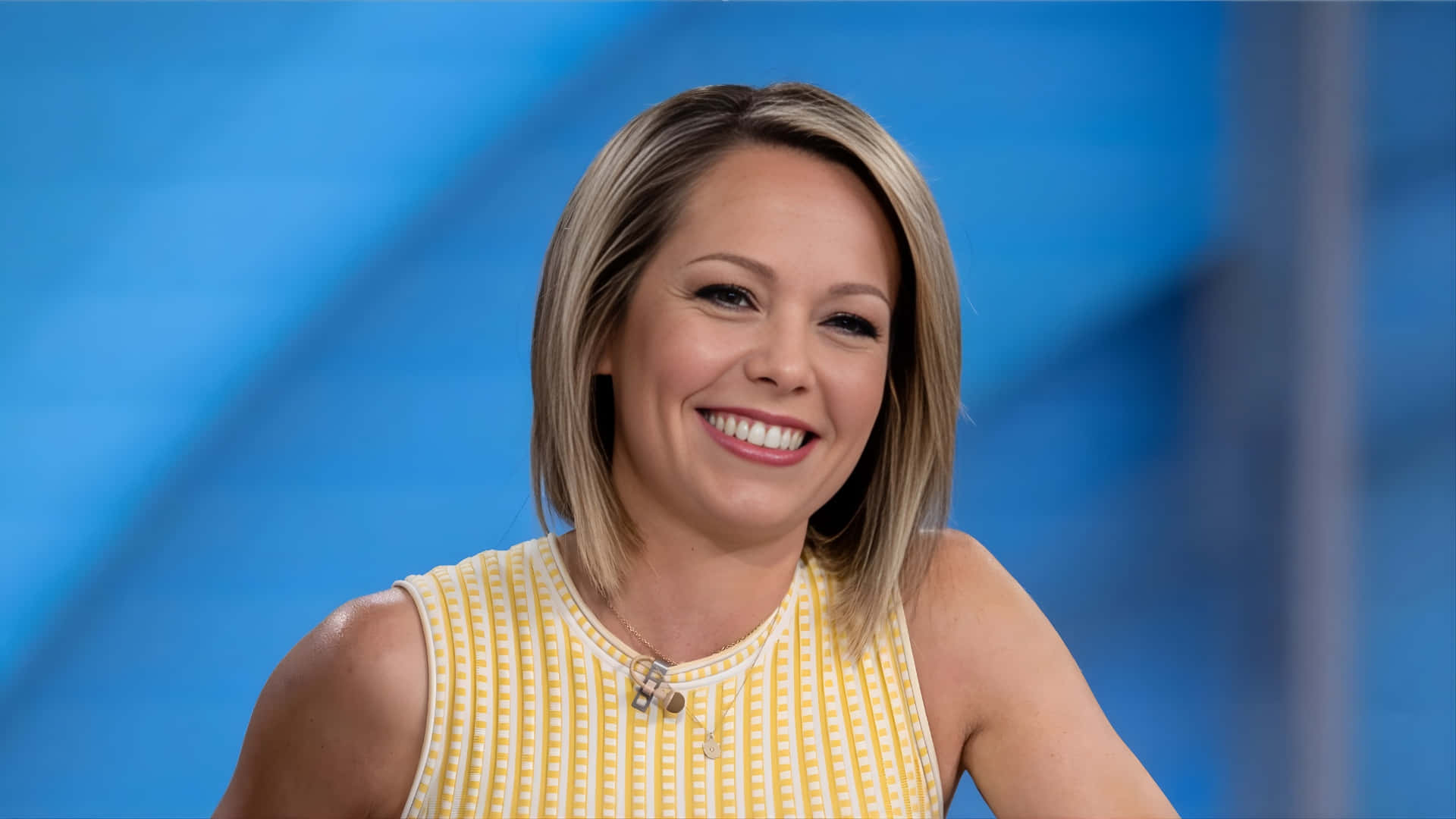 Dylan Dreyer, yellow and white checkered top, blue background, Full HD Desktop Wallpaper