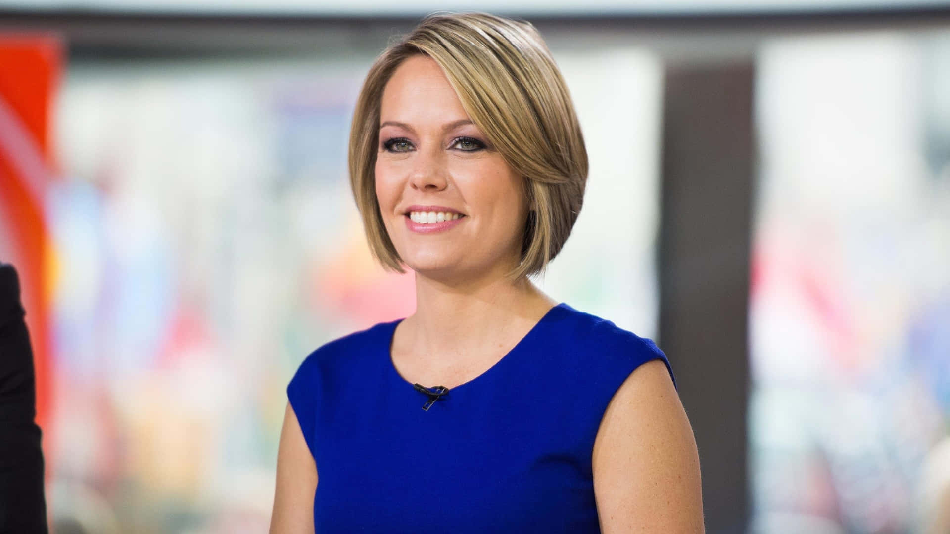 Dylan Dreyer, vibrant blue sleeveless top, softly blurred studio setting, Full HD Desktop Wallpaper