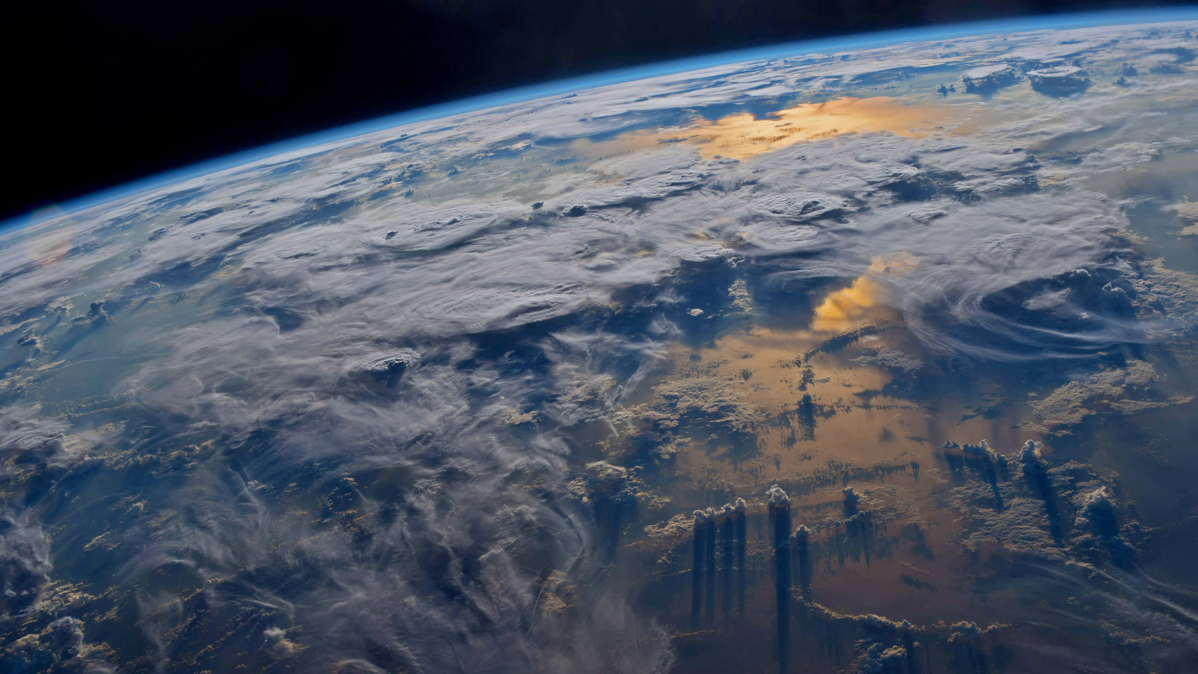 Earth, outer space, swirling clouds, 4K Desktop Wallpaper