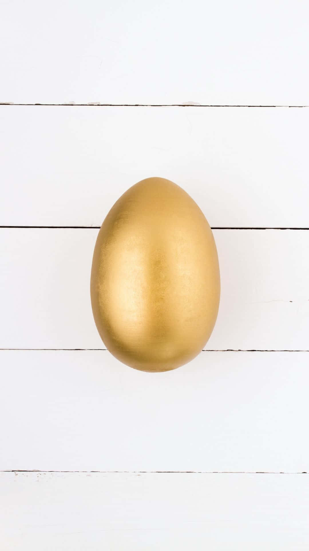 golden egg, white wooden planks, soft even lighting, Full HD Phone Wallpaper