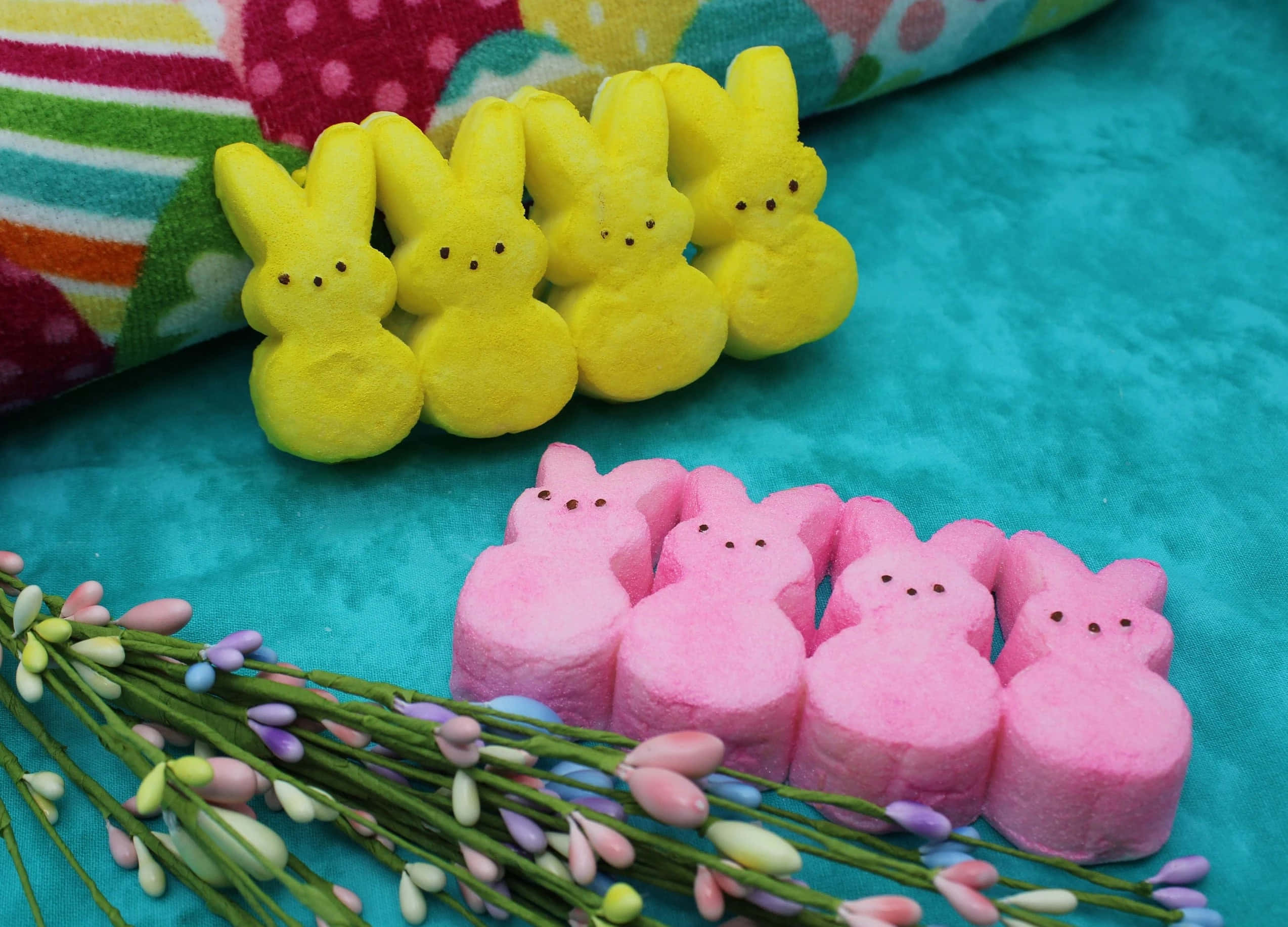 Easter Peeps, yellow and pink bunny-shaped marshmallow candies, teal fabric with colorful patterned cloth, Full HD Desktop Wallpaper