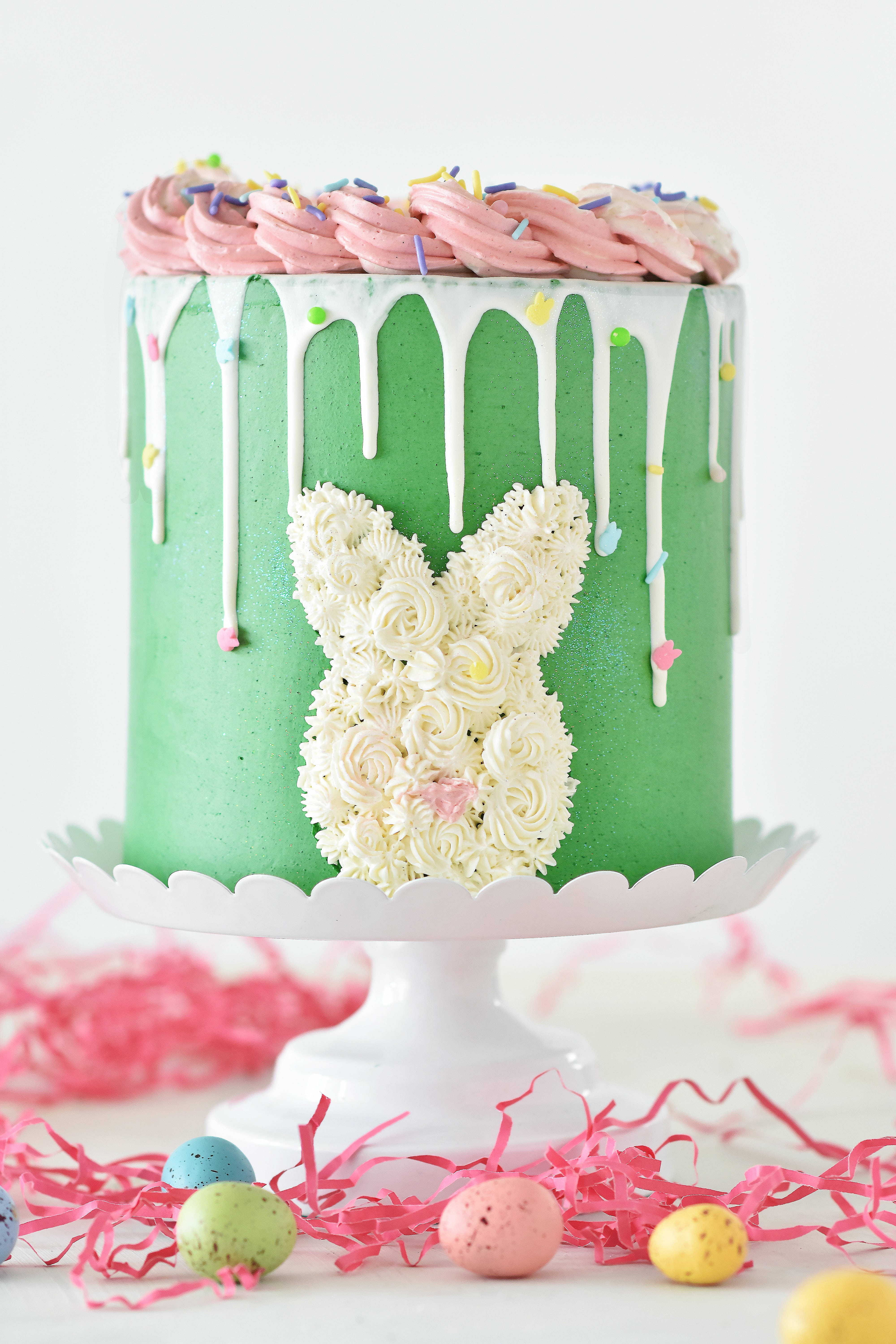 green Easter cake, white frosting bunny, pink drip icing, 5K Phone Wallpaper