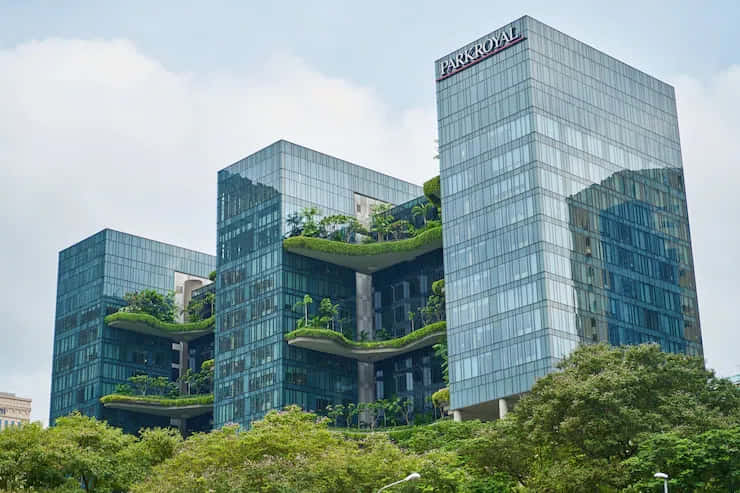 Modern glass skyscrapers, lush green terraces, dense foliage, SD Desktop Wallpaper