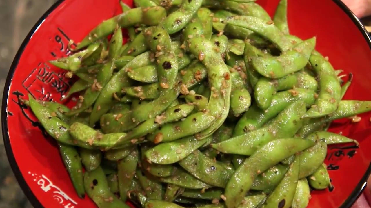 stir fried edamame beans, vibrant red bowl, glossy green edamame pods, HD Desktop Wallpaper