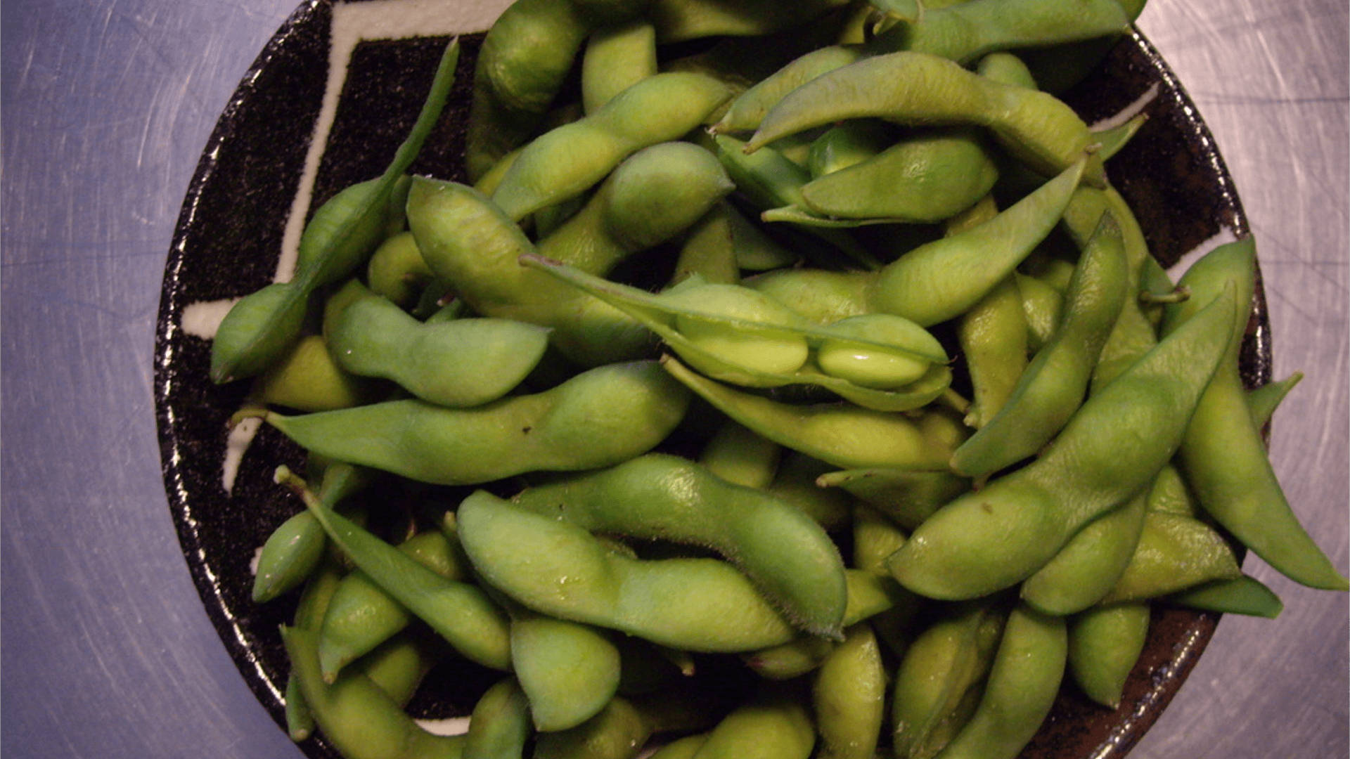 edamame beans, black speckled bowl, brushed metal surface, Full HD Desktop Wallpaper