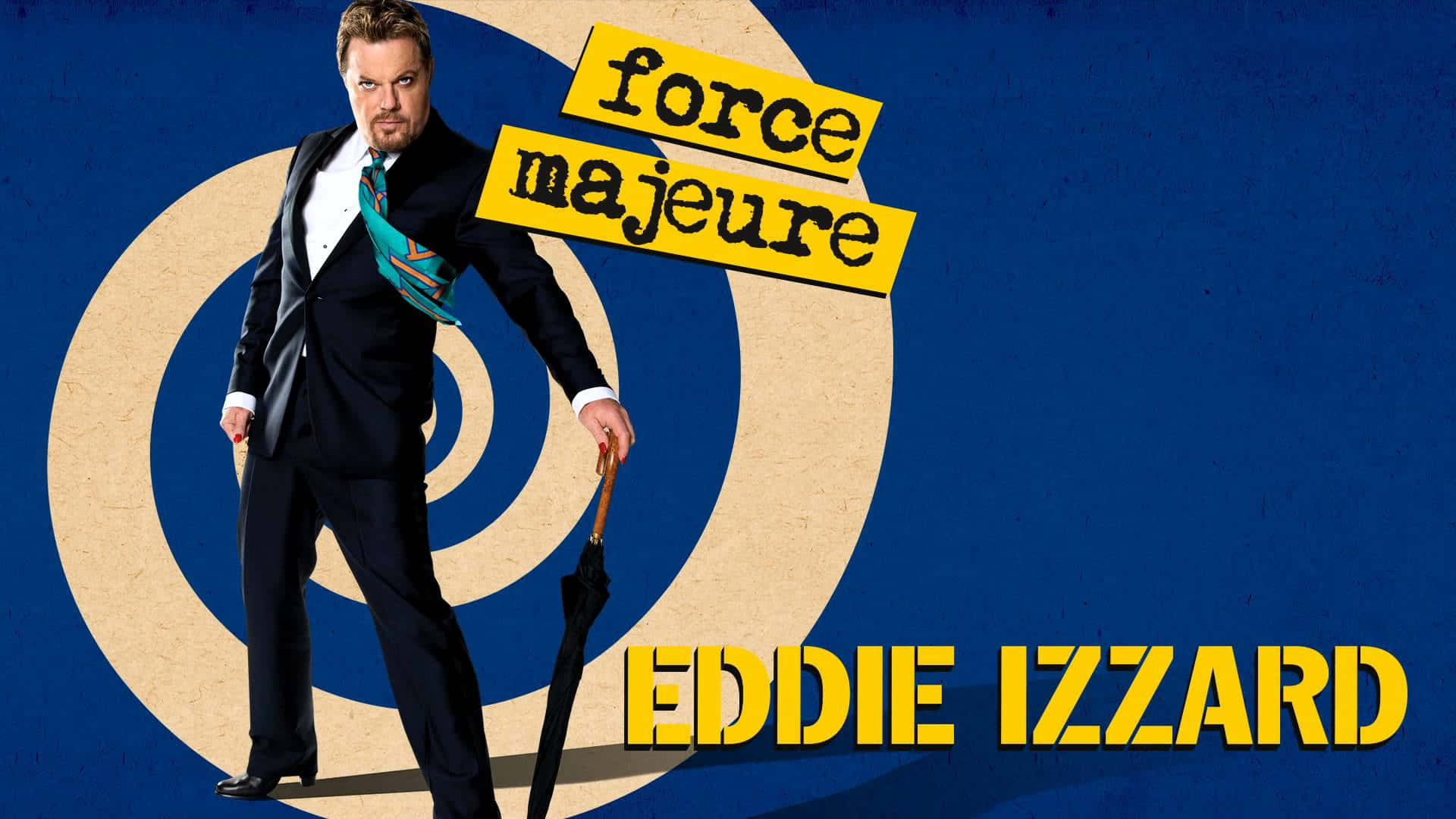 Eddie Izzard, sharp suit, bold blue background, Full HD Desktop Wallpaper