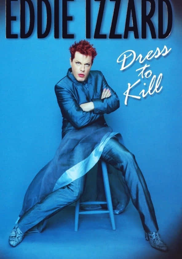 Eddie Izzard, sleek blue outfit, solid blue background, SD Phone Wallpaper