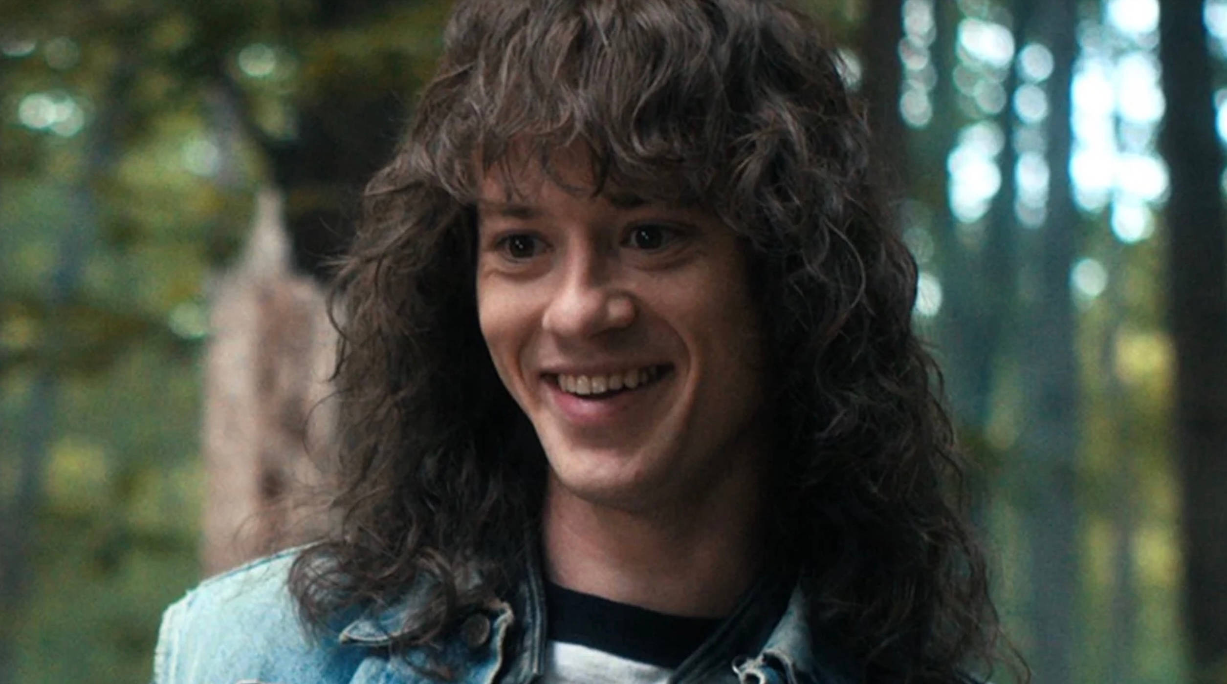 Eddie Munson, sunlit forest, long curly hair, Full HD Desktop Wallpaper
