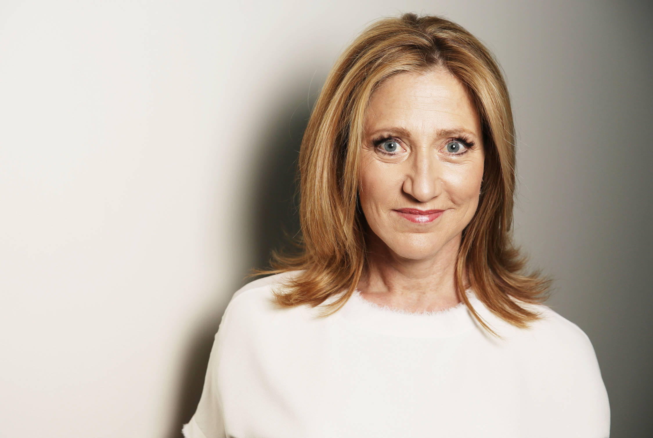 Edie Falco, white sweater, blonde hair, Full HD Desktop Wallpaper